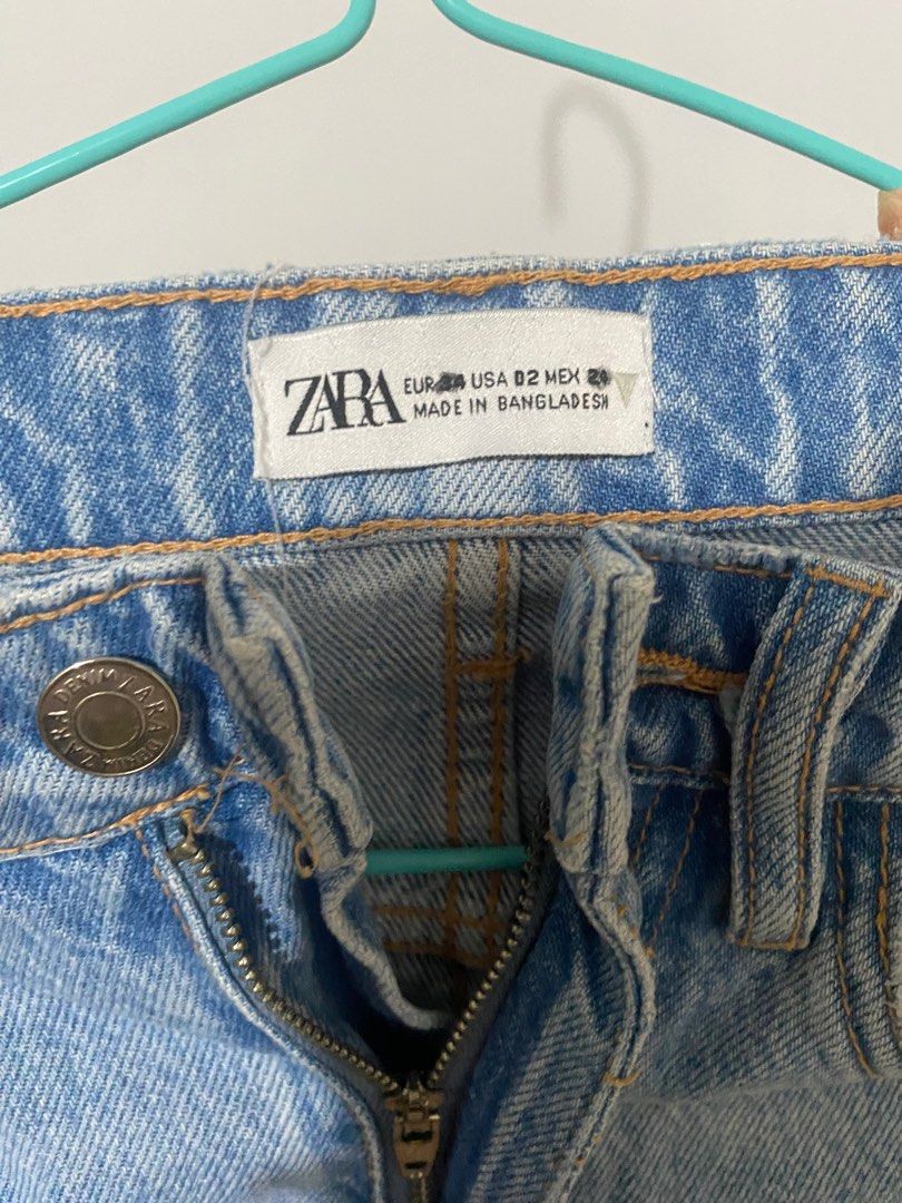 Zara Denim Shorts (Category: Shorts) located in San Pedro. Submitted by jen.declutter (Listing ID 1413281158, Image 3). Description: - Zara light blue denim shorts - Classic five-pocket design - Zipper fly - Distressed look with raw hem - Darker patch on the back -fits to size 25-27 waist line.