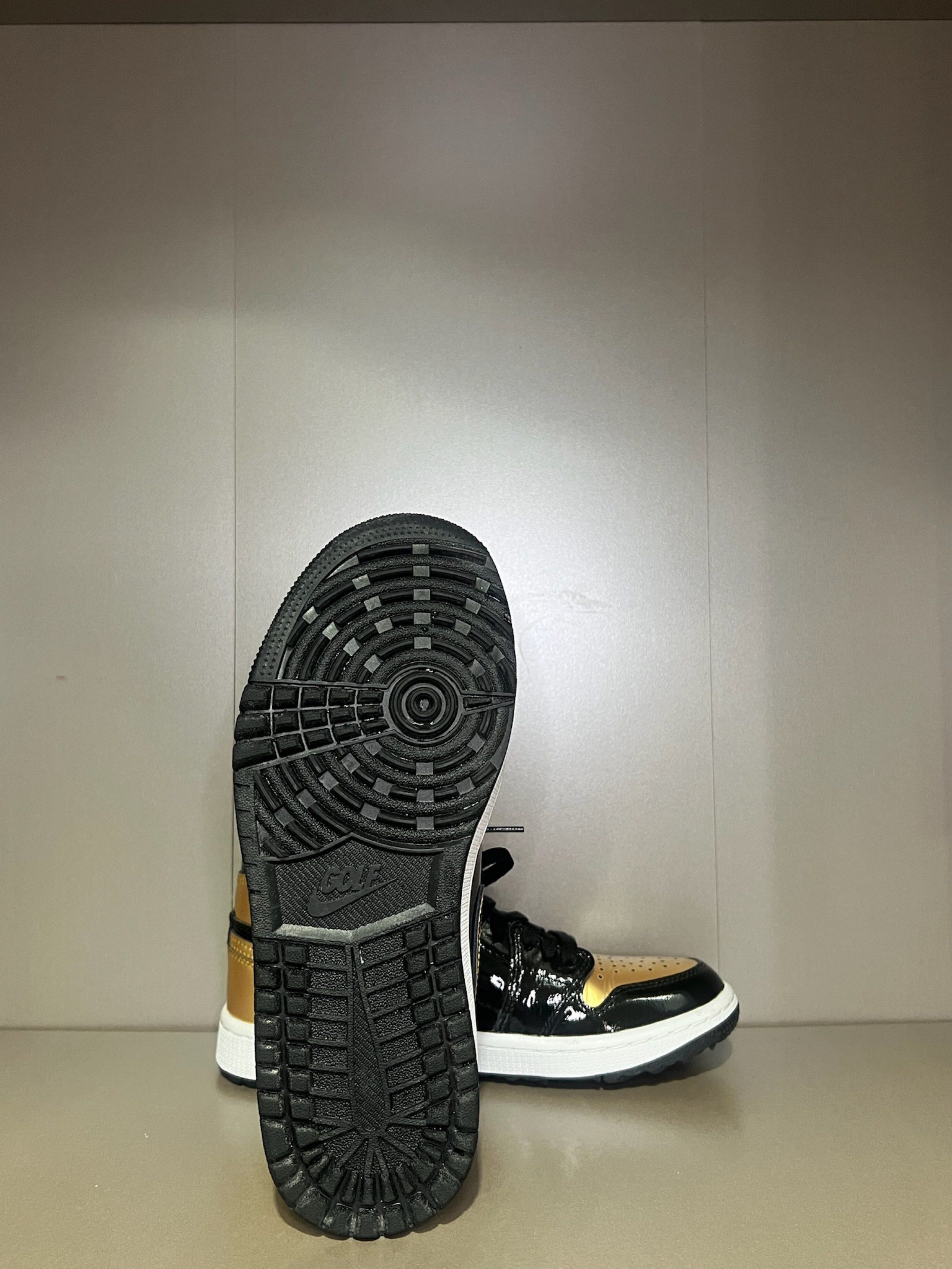 Air Jordan 1 Golf Black Gold (Category: Sneakers) located in Quezon City. Submitted by shoppaloco (Listing ID 1418598255, Image 3). Description: - Air Jordan 1 Golf shoes - Colorway: Black and Gold - White midsole - Black outsole - Black swoosh - Jordan logo on the side - "GOLF" logo on the tongue - Unworn condition.