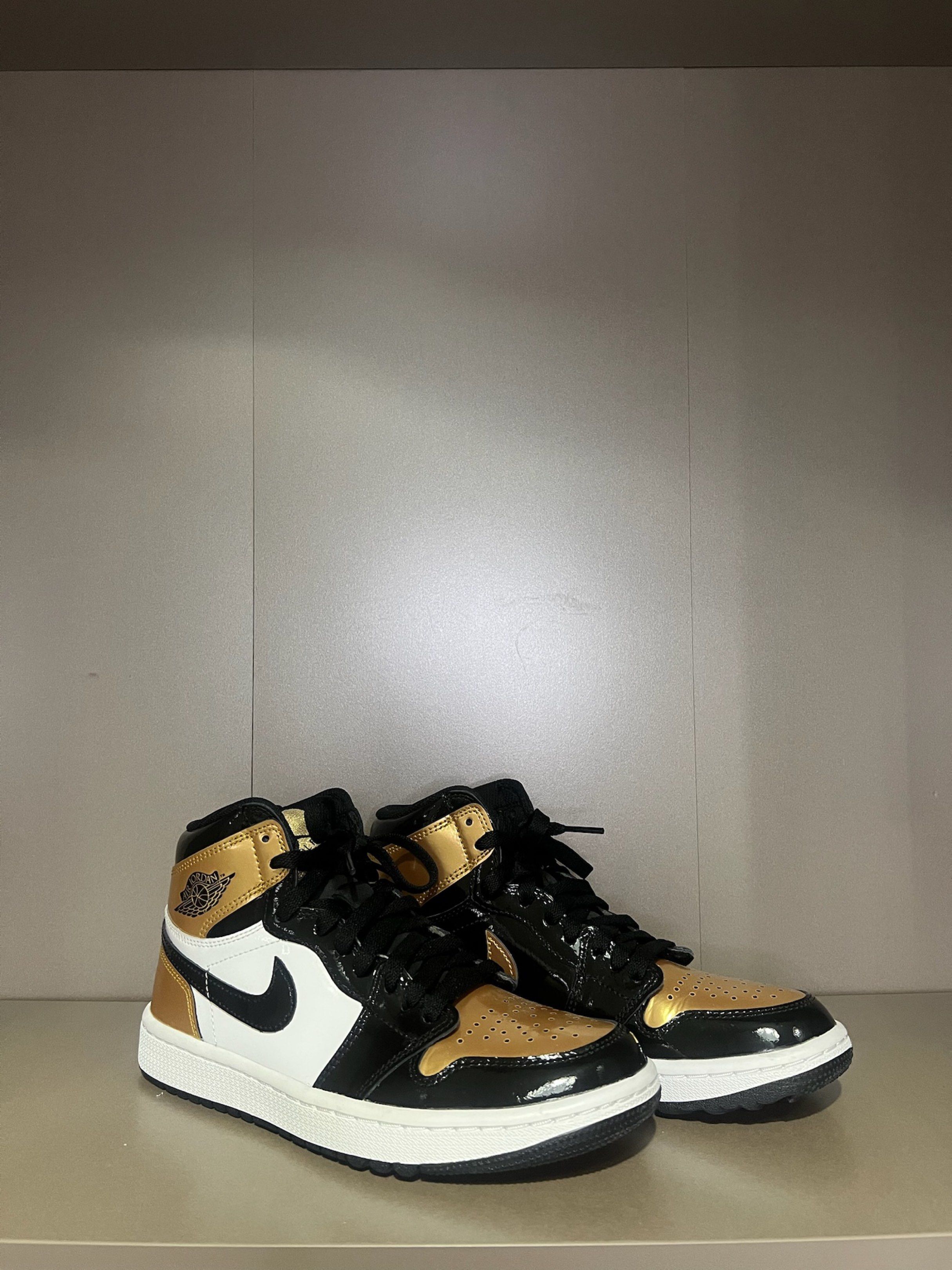 Air Jordan 1 Golf Black Gold (Category: Sneakers) located in Quezon City. Submitted by shoppaloco (Listing ID 1418598255, Image 1). Description: - Air Jordan 1 Golf shoes - Colorway: Black and Gold - White midsole - Black outsole - Black swoosh - Jordan logo on the side - "GOLF" logo on the tongue - Unworn condition.