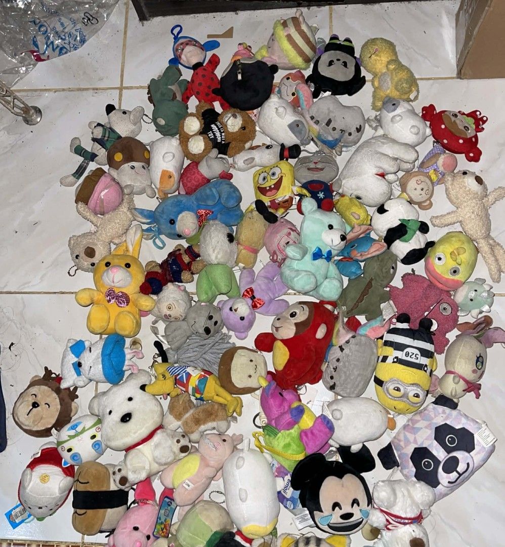 Assorted Plush Toys (Category: Plushies & Soft Toys) located in Cotabato. Submitted by hanshasells03 (Listing ID 1418768191, Image 1). Description: - Assorted plush toys for sale. 70 pcs All mix Charms and SMALL toys - Characters include Spongebob, Mickey Mouse, panda, and more! - Different sizes and designs available. - Perfect for collectors or gifts. - Some toys with tags. - Suitable for kids and adults..