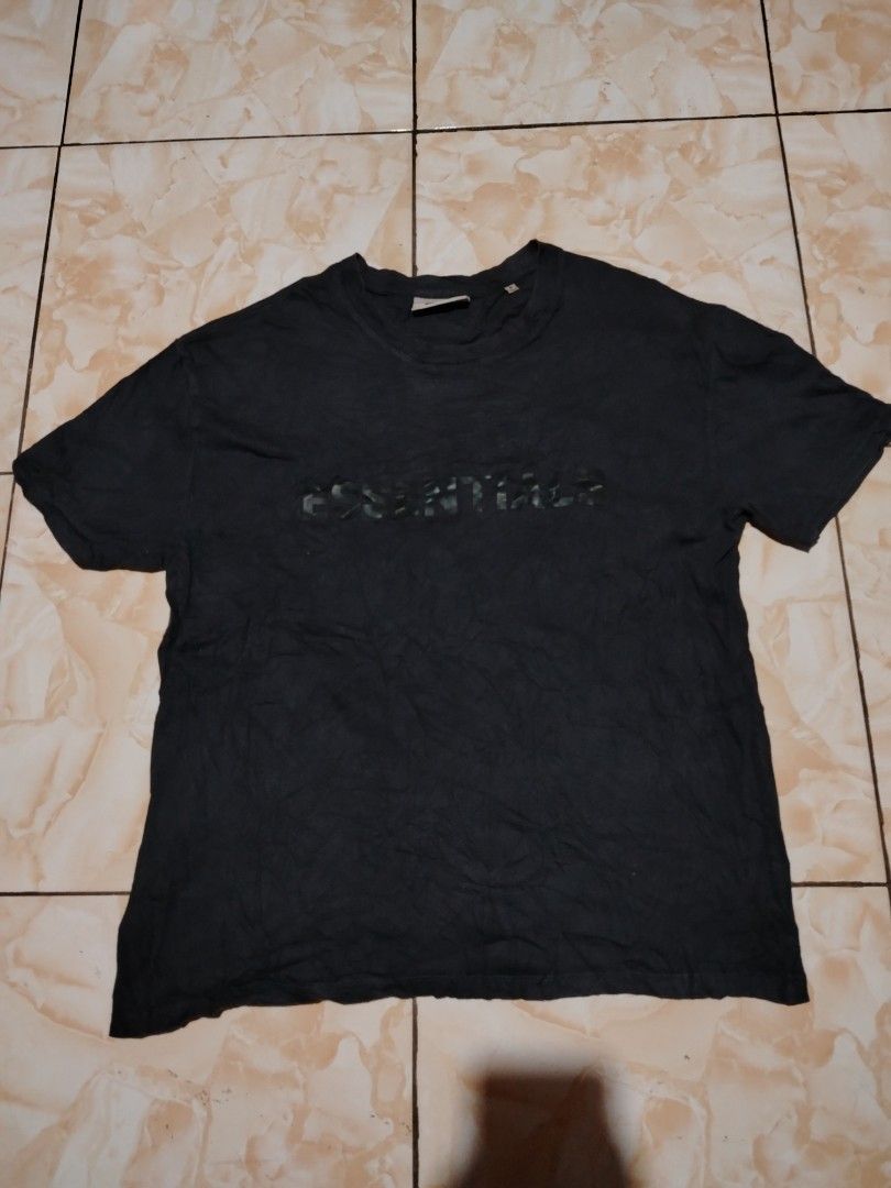 Authentic Essentials Fear of God T-shirt (Oversized) (Category: Tshirts & Polo Shirts ) located in Baguio. Submitted by maver1ckgoose (Listing ID 1418723928, Image 1). Description: - Essentials Fear of God T-shirt (Oversized) - Size: Medium -W-23 -L-29 - Material: 100% Cotton - Features brand name on chest - Color: Dark - Made in Vietnam -color may vary due to lighting.