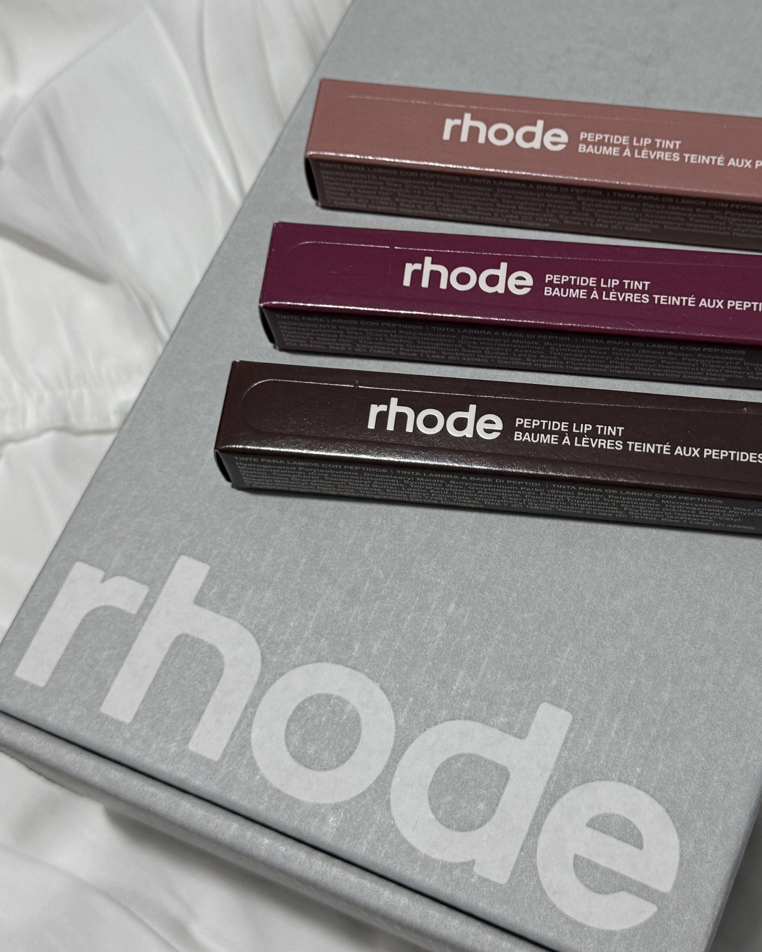 AUTHENTIC Rhode Peptide Lip Tint - Raspberry Jelly (Category: Makeup) located in Manila. Submitted by findrskeeprs.ph (Listing ID 1418748095, Image 2). Description: @findrskeeprs.ph on instagram 🛒 guaranteed authentic ⭐️ bought directly from rhode website (can provide receipt and more photos) onhand shades: • toast • raspberry jelly • espresso.