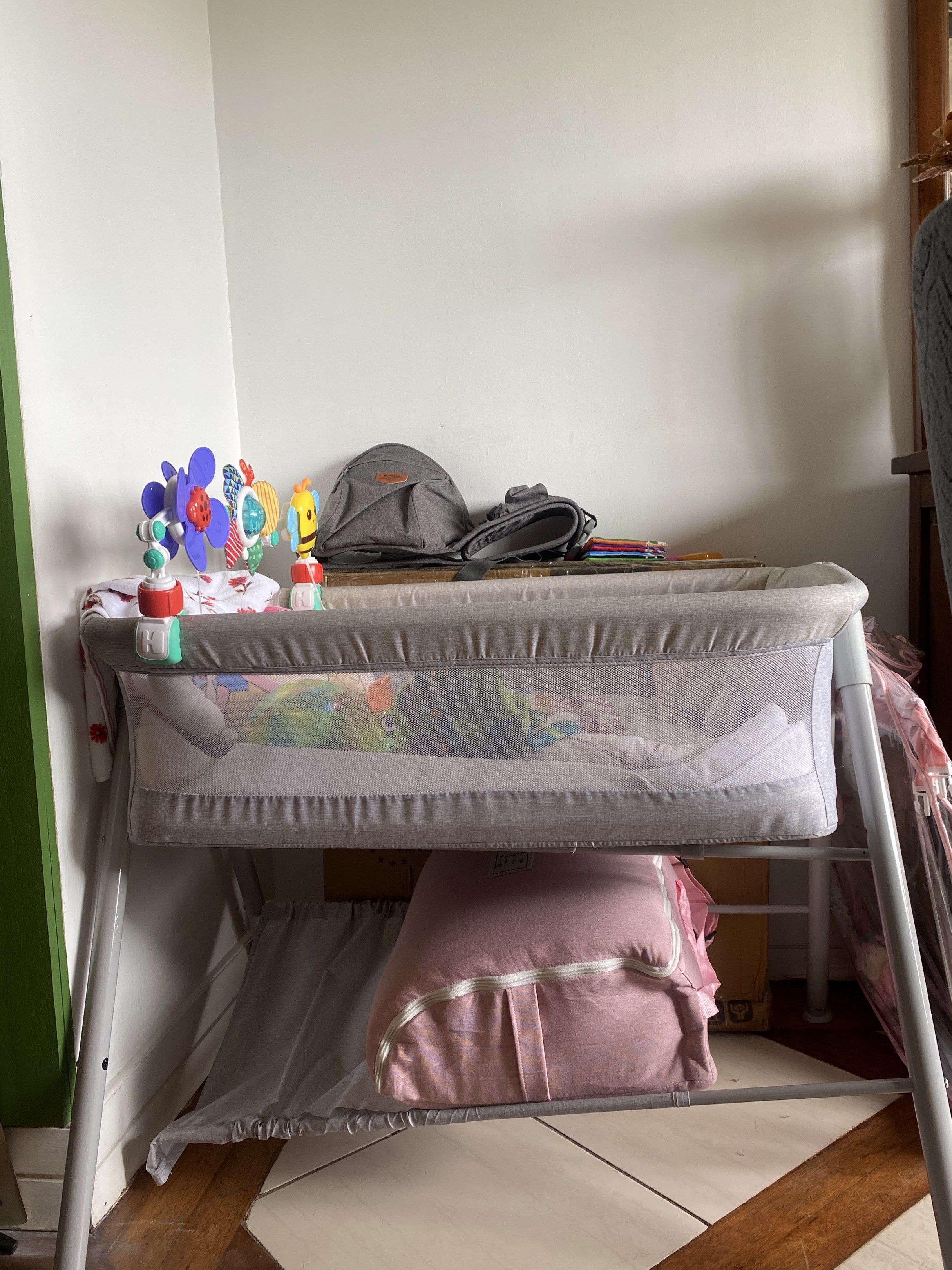 Baby Bassinet with Storage (Category: Cots & Cribs) located in Pasig City. Submitted by monicadeclutters (Listing ID 1418611554, Image 1). Description: - Gray baby bassinet - Mesh side for ventilation - Lower shelf for storage - Barely used since we decided to co-sleep 🤣 - Simple design.