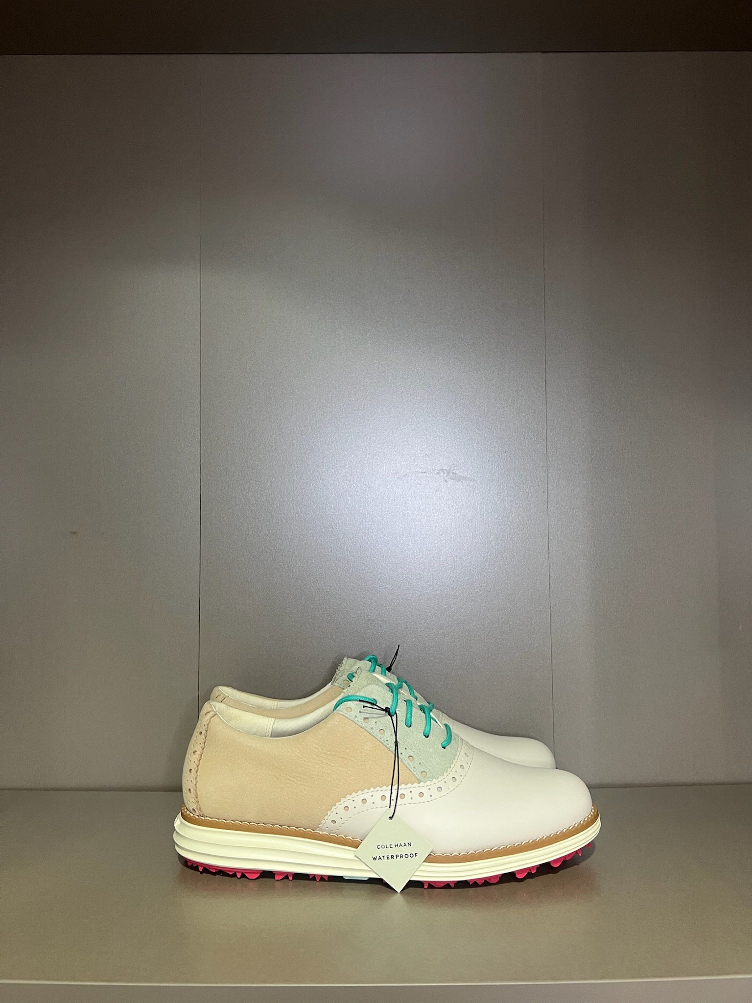 Cole Haan Waterproof Golf Shoes (Category: Golf) located in Quezon City. Submitted by shoppaloco (Listing ID 1418598407, Image 1). Description: - Cole Haan waterproof golf shoes - White and beige leather upper - Turquoise laces and accents - Pink and white sole - Includes original tags - Classic saddle shoe design - 36 EU .
