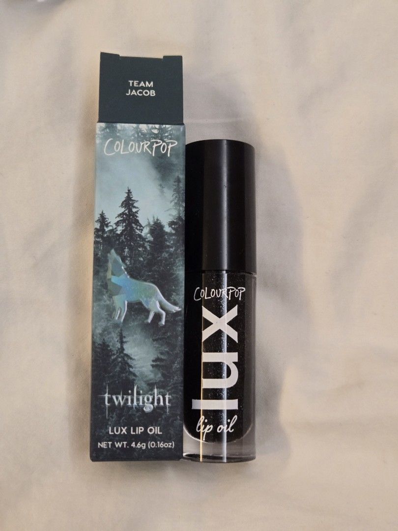 ColourPop Twilight Lux Lip Oil (Category: Makeup) located in Quezon City. Submitted by miks7322 (Listing ID 1418706302, Image 3). Description: ColourPop Twilight Lux Lip Oil Available Shades: Team Edward (blue) Team Jacob (black).