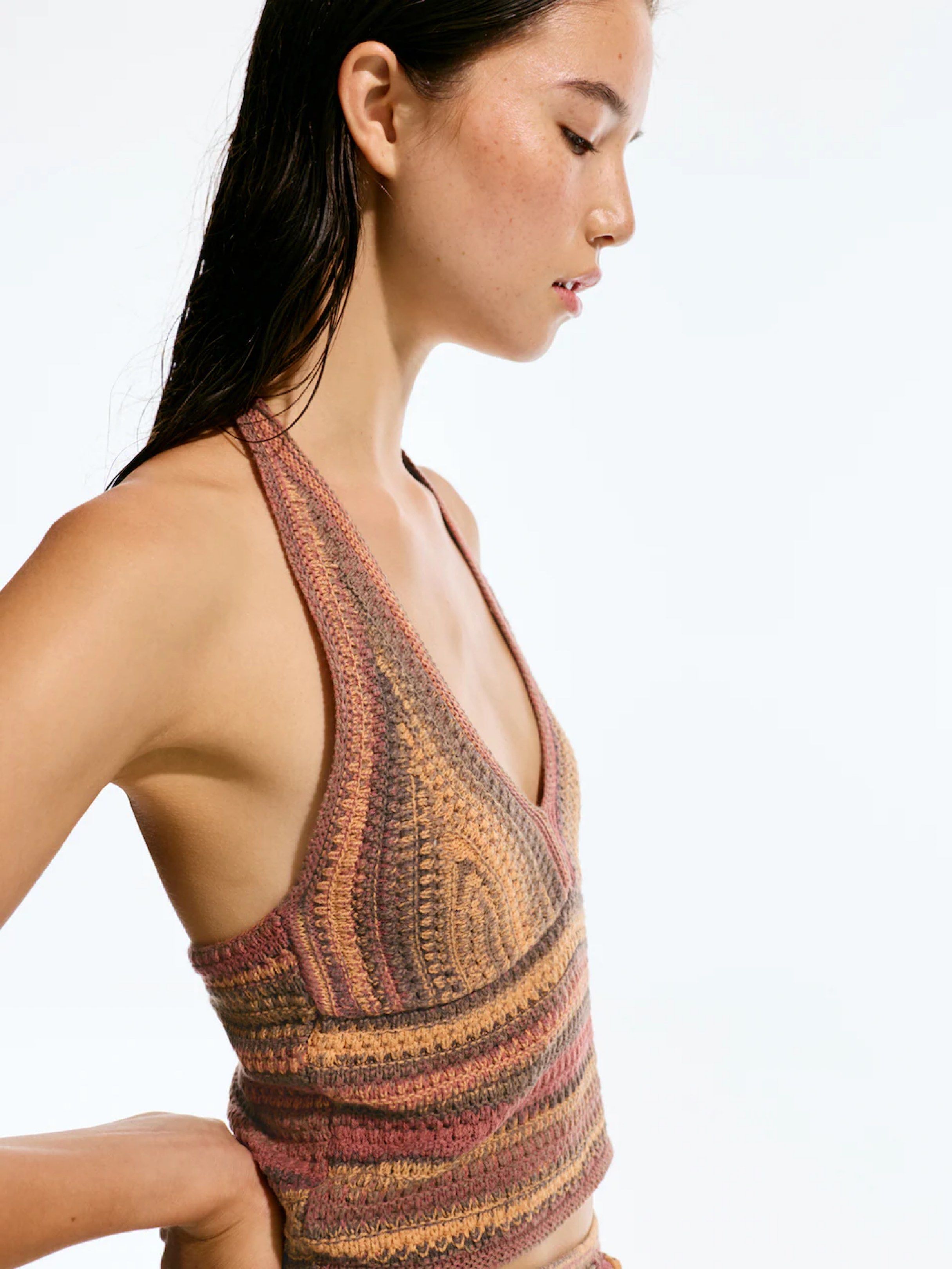 Crochet Halter Top (Category: Sleeveless) located in Davao. Submitted by declutterstuff01 (Listing ID 1418722527, Image 1). Description: - like new used once -Crochet halter top - V-neck design - Tie-back closure - Flattering fit - Warm color palette - Ideal for casual or beach outfits - Stylish and comfortable.