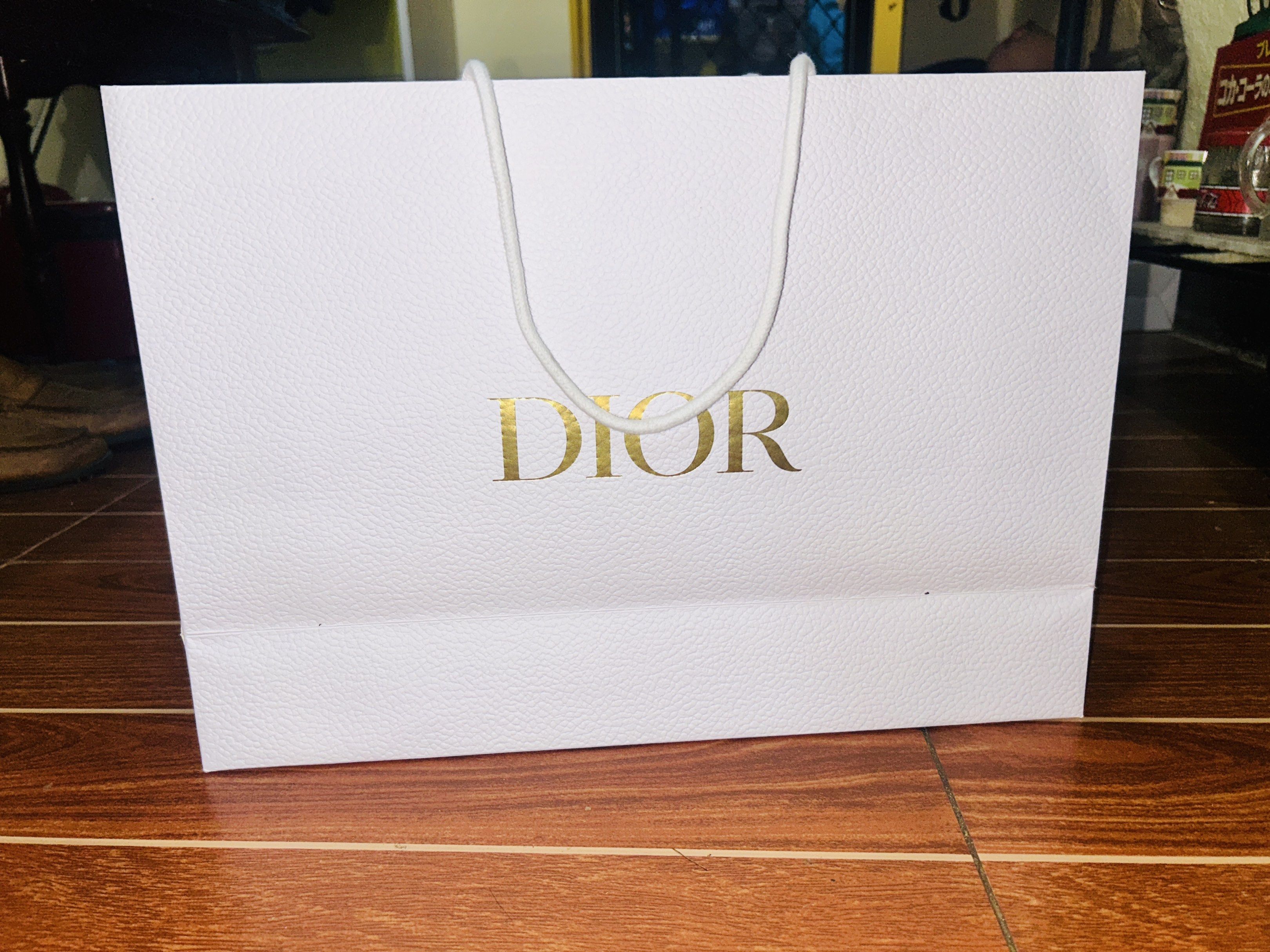 Dior paper bag (Category: Luxury Accessories) located in Davao. Submitted by japanamerican (Listing ID 1418763668, Image 1). Description: Like new Size large Authetic.