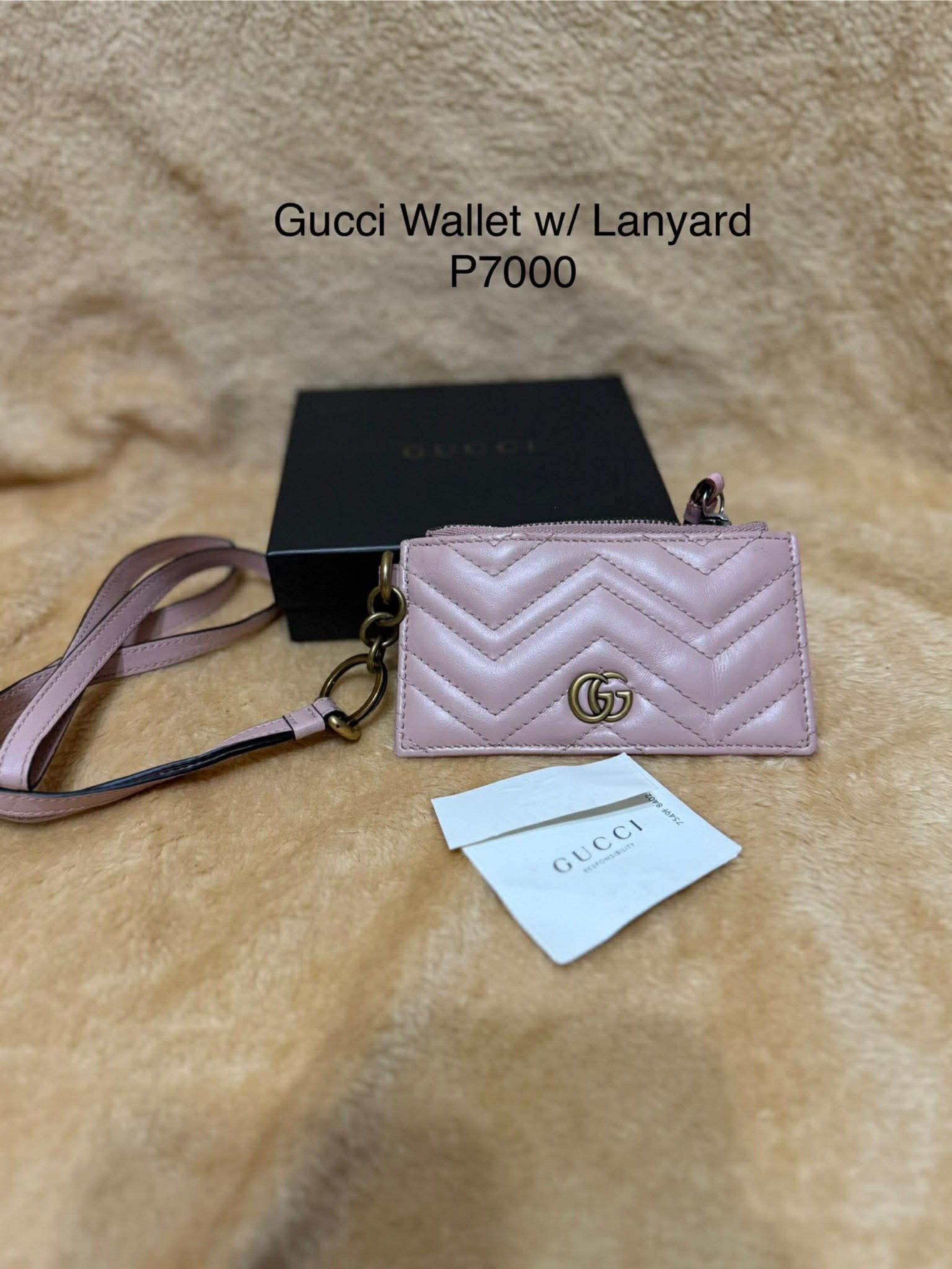 Gucci Wallet w/ Lanyard (Category: Luxury Bags & Wallets) located in Manila. Submitted by ceeh.sells (Listing ID 1418732460, Image 1). Description: - Authentic Gucci wallet - Features a pink, quilted design - Iconic GG logo - Includes original box and authenticity card - Zipper closure - Multiple card slots - Comes with a lanyard - Stylish and functional accessory Slight dent/wrinkle due to storage.