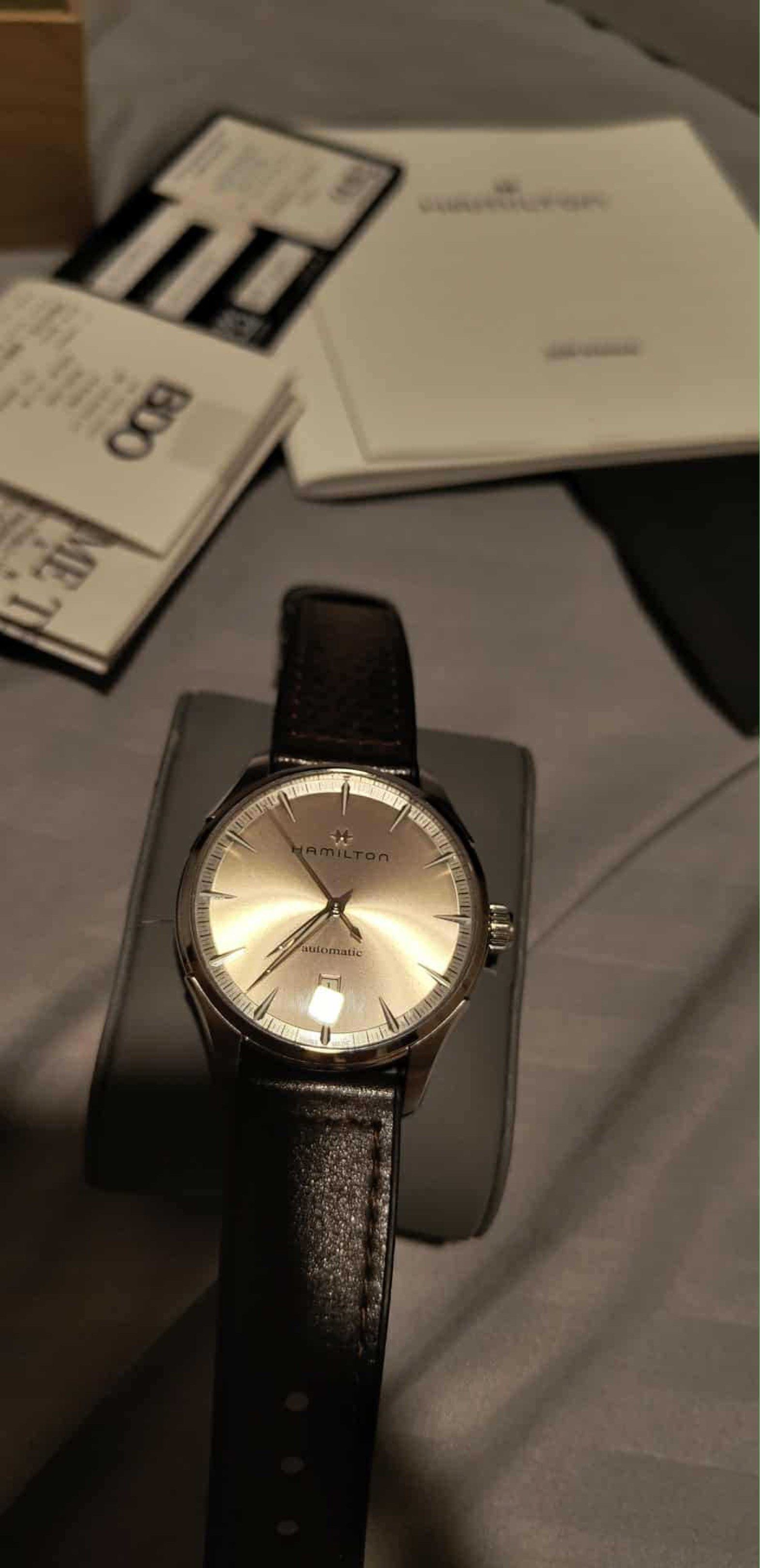 Hamilton Jazzmaster H32475520 (Category: Men's Watches) located in Manila. Submitted by mariaaa1 (Listing ID 1418643058, Image 3). Description: Details: • Brand: Hamilton • Model: Jazzmaster • Ref: H32475520 • Automatic Movement (Hamilton Caliber H-10) • 80-hour power reserve • Sapphire glass • Stainless steel case • Case size: 40mm • Water resistance: 5 ATM • Champagne dial with luminous hands & indexes • Date function • Brown leather strap (20m