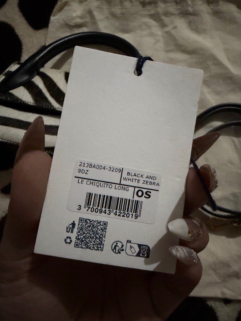 jacquemus le chiquito long (Category: Luxury Bags & Wallets) located in Navotas City. Submitted by lexichiu77 (Listing ID 1418652396, Image 3). Description: This is a Jacquemus Le Chiquito Long bag in zebra-printed calfskin pony-hair. .