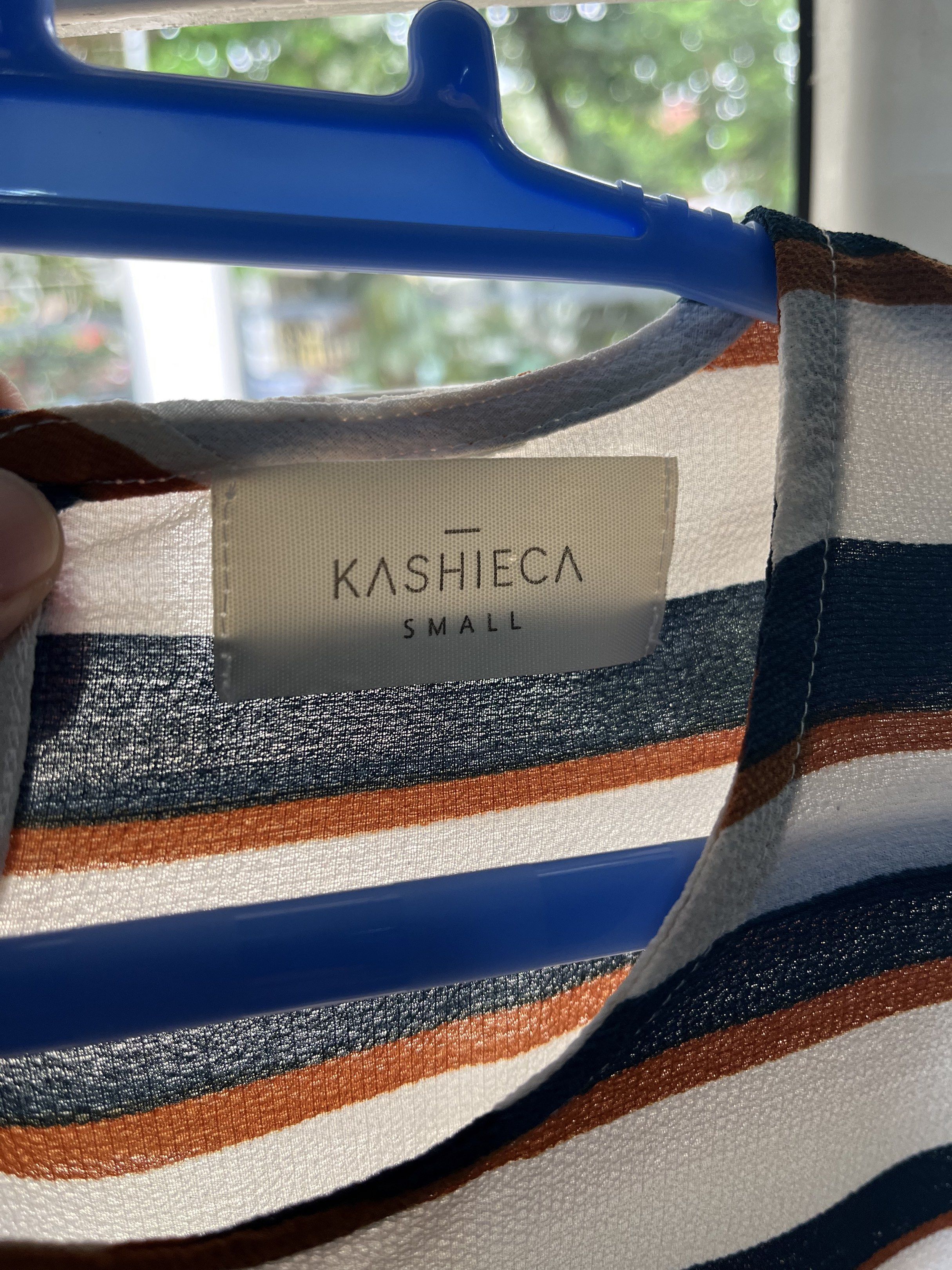 KASHIECA Striped Top and Pants Set - Small (Category: Sets or Coordinates) located in Las Pinas. Submitted by sortandsimplify (Listing ID 1418773037, Image 2). Description: - KASHIECA two-piece set - Includes a sleeveless top and pants - Features a striped pattern (white, navy, brown) - Top: Round neckline - Pants: Wide-legged - Size: Small.