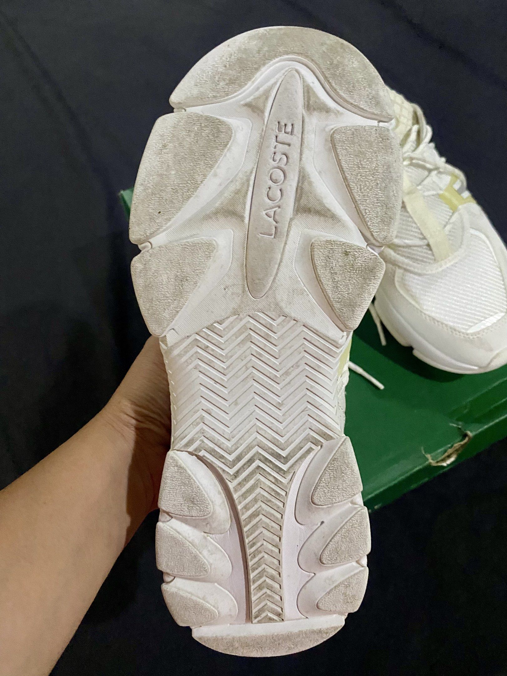 Lacoste SMA White Sneakers (Category: Sneakers) located in Pasig City. Submitted by iphel (Listing ID 1418637890, Image 2). Description: - Lacoste SMA sneakers - White with light yellow accents - Size: 6.5 UK / 40 EUR / 7.5 USA - Textile material - Includes original box - Made in Vietnam Used 2x. Perfect fift for Size 39 with wide feet..