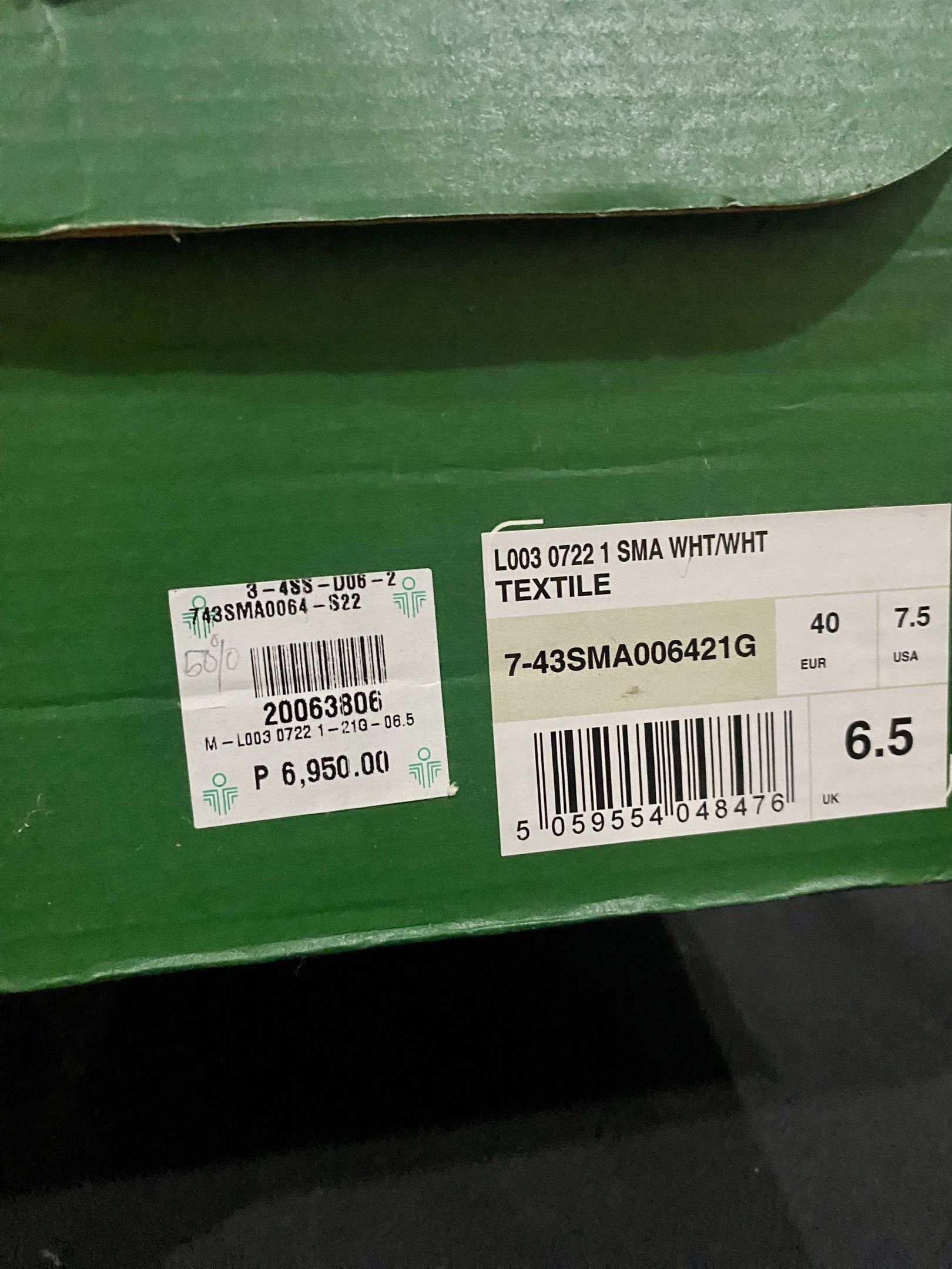 Lacoste SMA White Sneakers (Category: Sneakers) located in Pasig City. Submitted by iphel (Listing ID 1418637890, Image 1). Description: - Lacoste SMA sneakers - White with light yellow accents - Size: 6.5 UK / 40 EUR / 7.5 USA - Textile material - Includes original box - Made in Vietnam Used 2x. Perfect fift for Size 39 with wide feet..