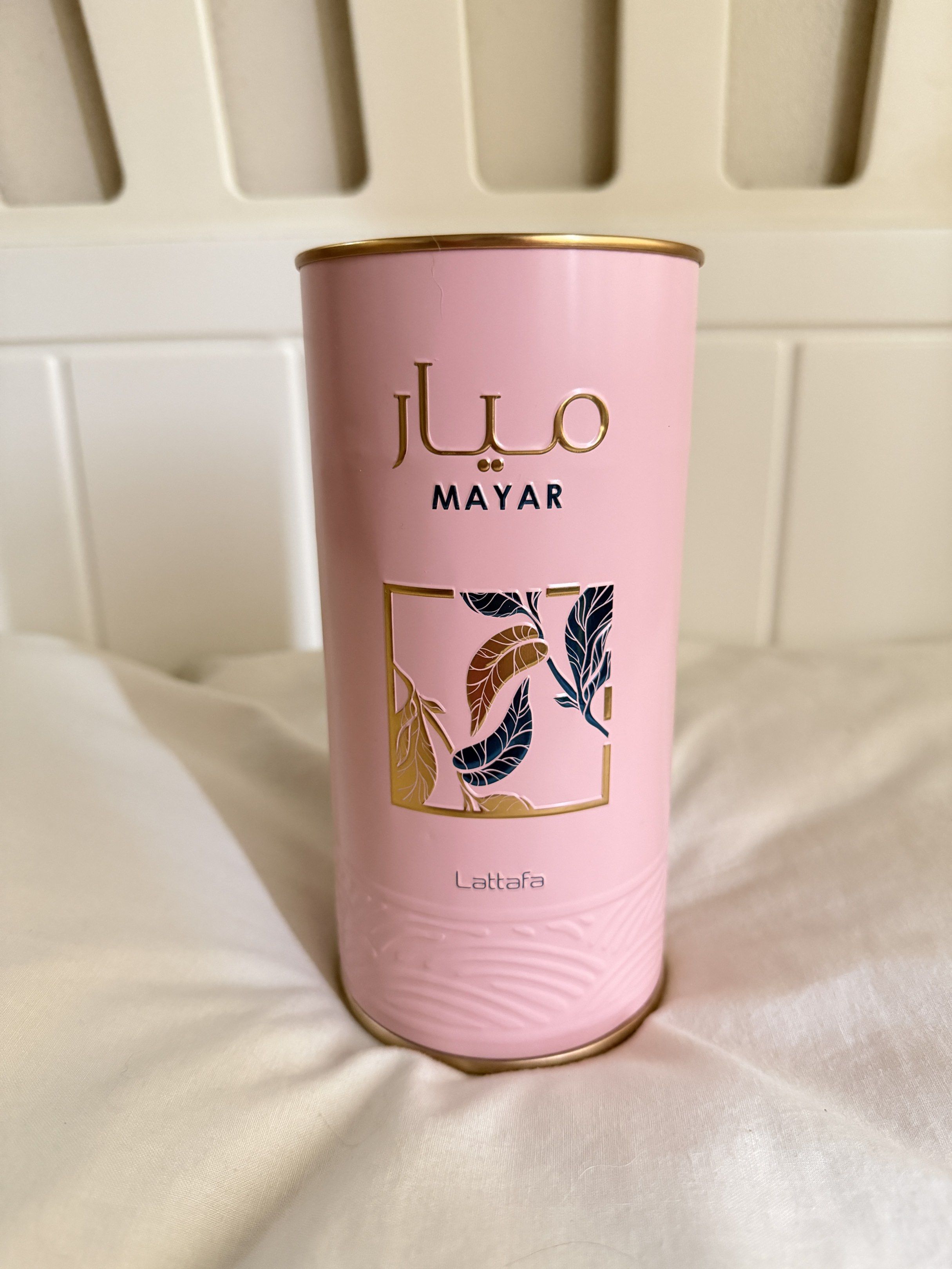 Lattafa Mayar Eau de Parfum (Category: Fragrance & Deodorants) located in Manila. Submitted by sashimille (Listing ID 1418609092, Image 1). Description: - Lattafa Mayar Eau de Parfum - Comes in a pink bottle with a gold cap. - Presented in a matching pink can. - Box features the name "Mayar" in both Arabic and English. - The perfume has a light pink color. - Said to be a dupe of Mugler Angel Nova.