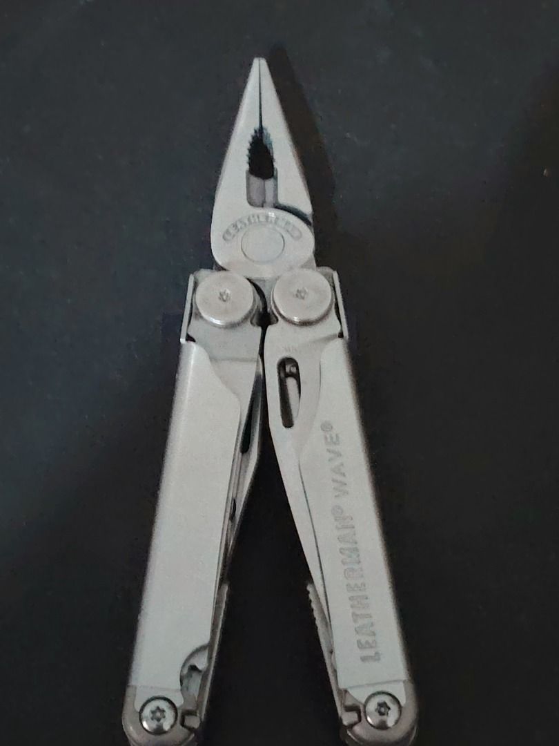 Leatherman Wave Multi-Tool (Category: Everything Else Others) located in Caloocan City. Submitted by glenn7289 (Listing ID 1418670885, Image 3). Description: - Leatherman Wave multi-tool - Features pliers, knives, saw, scissors, and other essential tools - Comes with a durable black nylon sheath - Sleek silver color - Includes the Leatherman Wave logo.