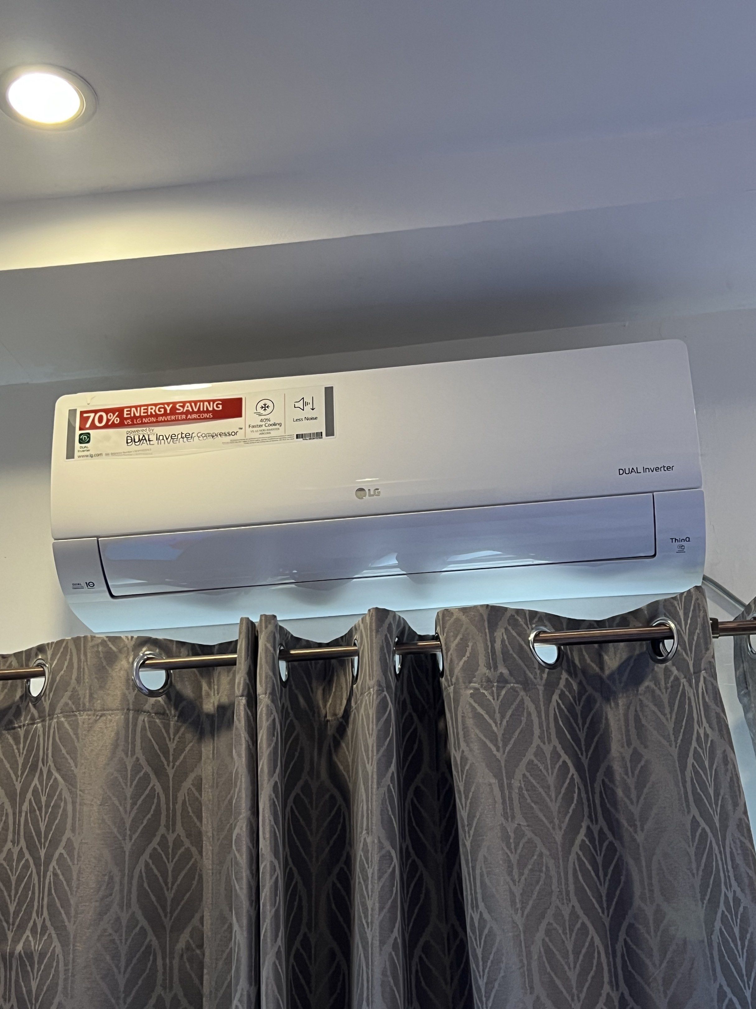 LG Dual Inverter Air Conditioner (Category: Air Conditioning and Heating) located in Pasig City. Submitted by blushonline (Listing ID 1418641934, Image 1). Description: - LG Dual Inverter air conditioner - Energy-saving technology - Includes indoor and outdoor units - Outdoor unit mounted on bracket - Indoor unit wall-mounted - White color - Designed for efficient cooling.