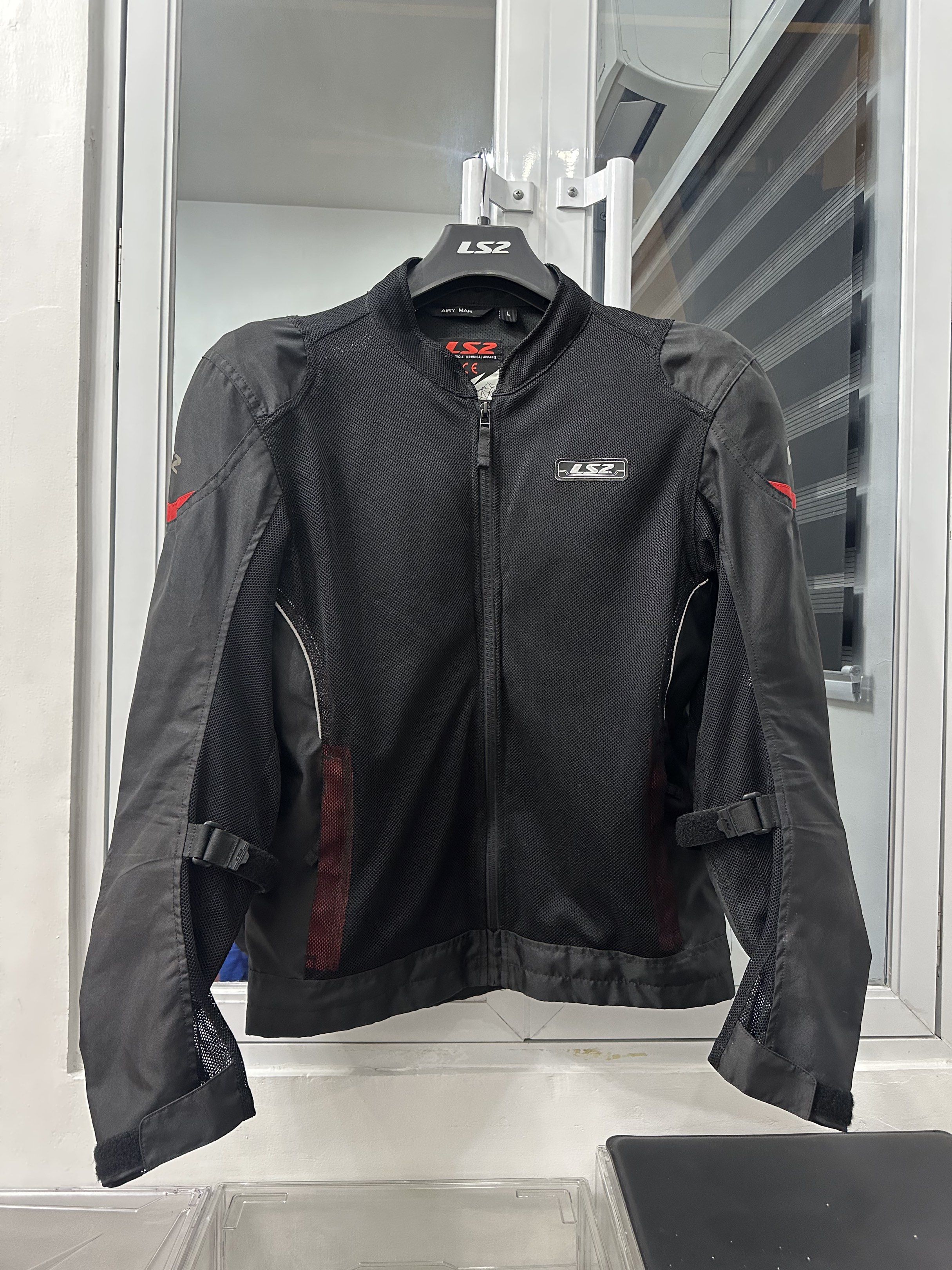 LS2 Airy Man Riding Jacket - Black (Category: Body Parts and Accessories) located in Quezon City. Submitted by rrbautista (Listing ID 1418734507, Image 1). Description: - LS2 Airy Man motorcycle riding jacket - Black/Red color, size L - Mesh panels for optimal ventilation - Adjustable waist and sleeve straps - CE certified paddings (back, chest, shoulders, elbows) - Bought for almost 4k+ sa motoworld - Used, please see actual pics posted.