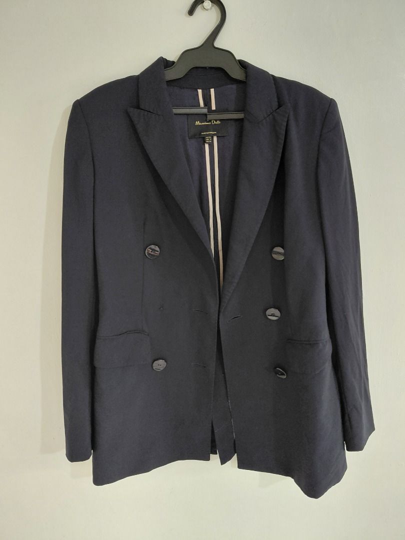 Massimo Dutti Navy Blazer (Category: Coats, Jackets and Outerwear) located in Makati City. Submitted by jisla (Listing ID 1418643353, Image 1). Description: - Massimo Dutti navy blazer - Double-breasted style - Multiple buttons - Light beige striped interior lining - Classic design - Suitable for various occasions.