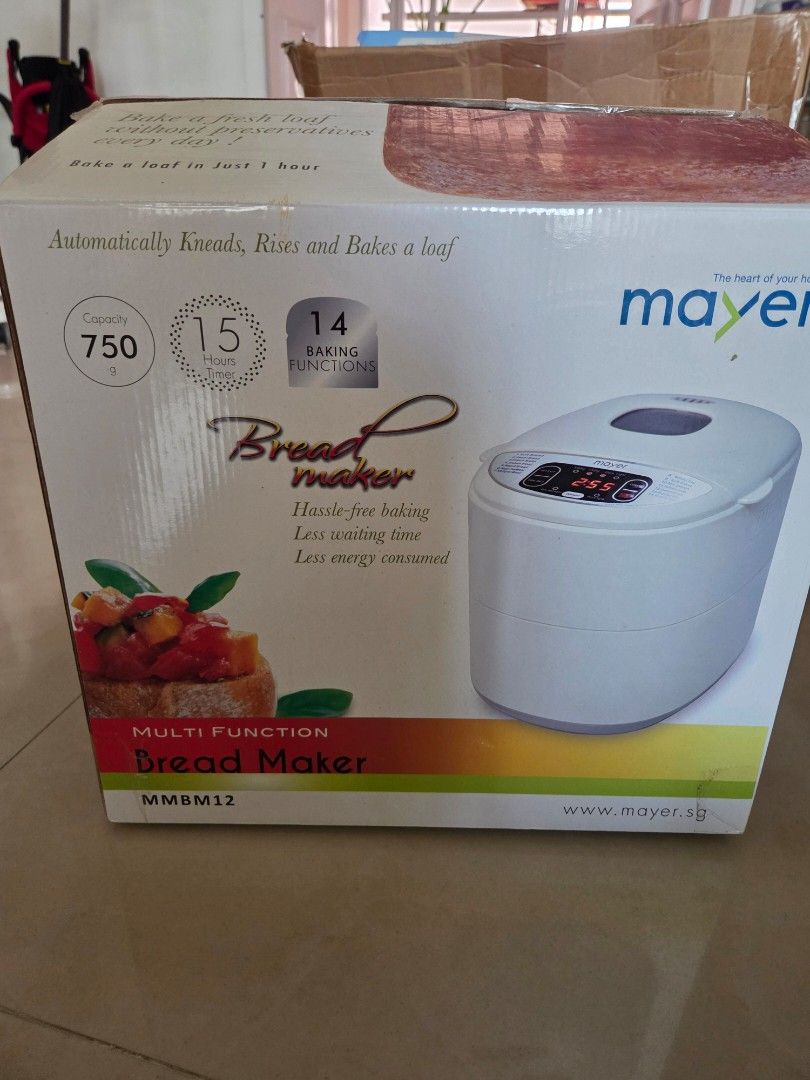 Mayer Multi-Function Bread Maker (MMSM12) (Category: Breadmakers) located in Singapore. Submitted by bravemountain.321001 (Listing ID 1418618124, Image 1). Description: Mayer BRAND NEW IN BOX multi-function bread maker. Features 14 baking functions, including soft bread, French bread, and jam. Makes 750g loaves. Includes a digital display and various settings for crust color and weight. Comes with original box. .