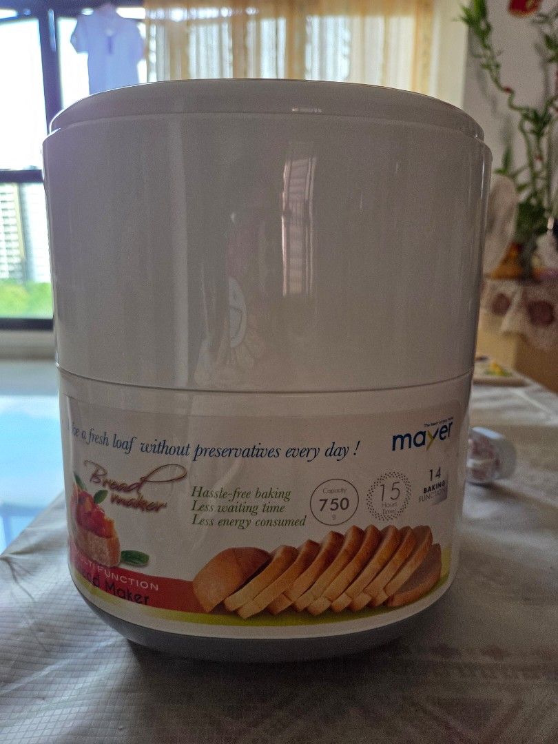 Mayer Multi-Function Bread Maker (MMSM12) (Category: Breadmakers) located in Singapore. Submitted by bravemountain.321001 (Listing ID 1418618124, Image 2). Description: Mayer BRAND NEW IN BOX multi-function bread maker. Features 14 baking functions, including soft bread, French bread, and jam. Makes 750g loaves. Includes a digital display and various settings for crust color and weight. Comes with original box. .