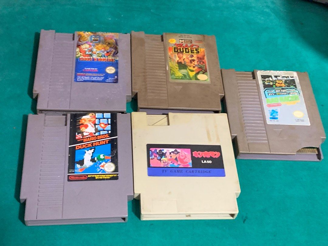 NES Game Cartridges - Assorted Titles (Category: Nintendo) located in Manila. Submitted by miah_collectiblesurplus (Listing ID 1418724366, Image 3). Description: 10,000 pesos Location: Valenzuela VINTAGE NES GAMES Tested working yung 9pcs na nakahiga Yung 5pcs na nakasandal di maread baka need linis di ko alam kayo na bahala sama ko na.