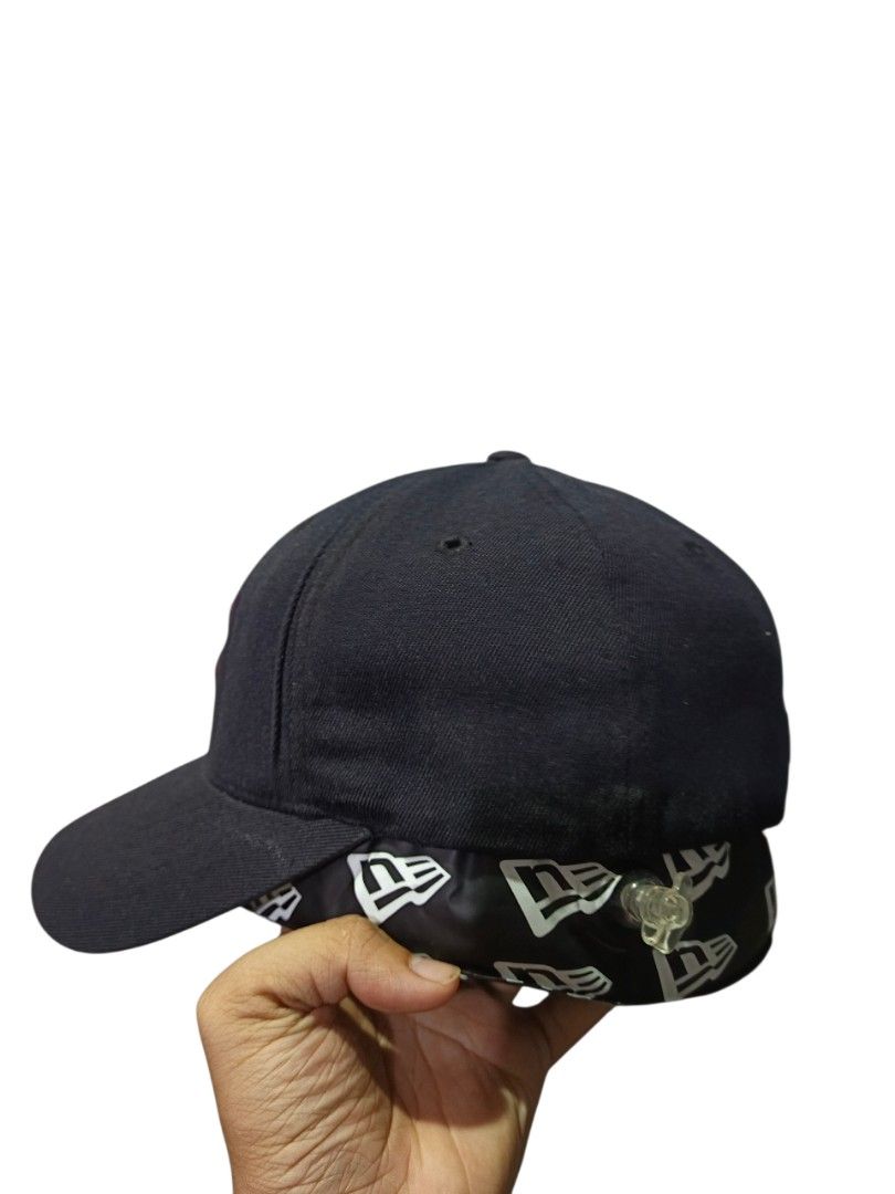 New Era MLB Baseball Cap (Category: Caps & Hats) located in General Santos City (Dadiangas). Submitted by _jackeith (Listing ID 1418742807, Image 3). Description: - New Era cap features the MLB logo and a 'B' logo on the front. - The cap has a black exterior with a maroon brim and logo accents. - The interior features a New Era logo pattern. - The size is XS-S. A great accessory for baseball fans..