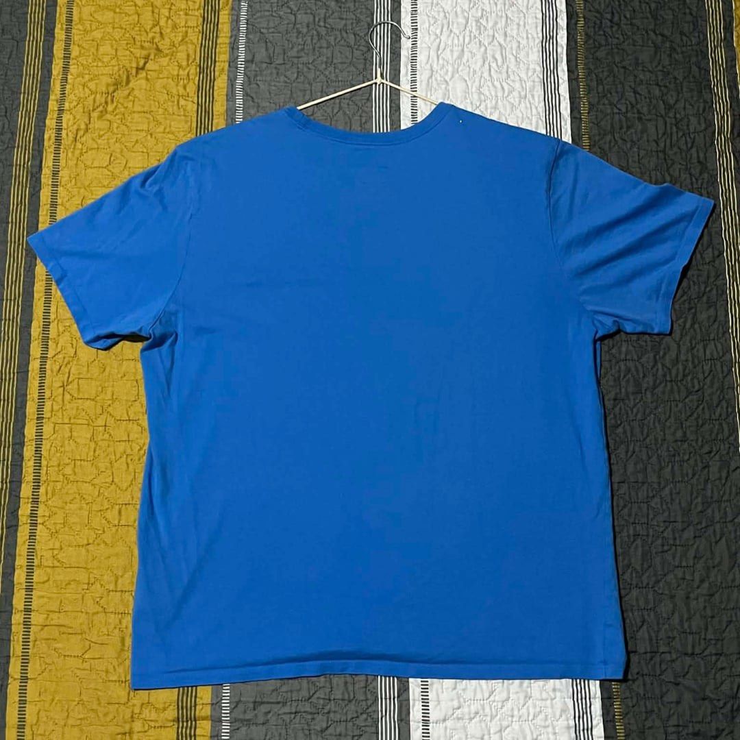 Nike Just Do It Blue T-shirt (Category: Tshirts & Polo Shirts ) located in Taguig. Submitted by nico.cab (Listing ID 1418628768, Image 2). Description: 👕NIKE 🏷️ Size: M 📐 Measurements: 21” x 26” 🎨 Color Condition: 9/10 ✨ Overall Condition: Good ⚠️ Issue: None.