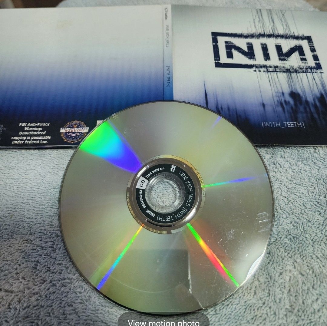 Nine Inch Nails – With Teeth (Category: CDs & DVDs) located in Cebu City. Submitted by g_roshamboo (Listing ID 1222818596, Image 2). Description: cd/dvd digipak.
