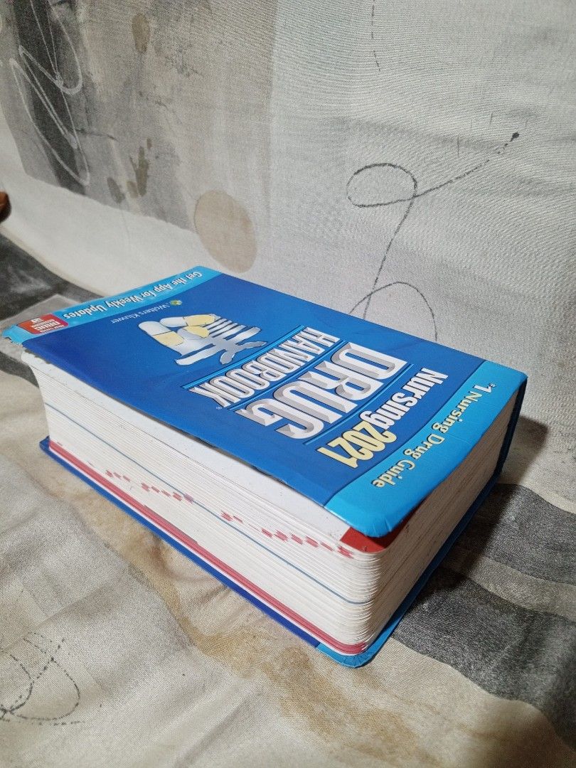 Nursing 2021 Drug Handbook (Category: Textbooks) located in Antipolo. Submitted by choco.naut (Listing ID 1418659770, Image 3). Description: Nursing 2021 Drug Handbook by Wolters Kluwer 🩺 - Comprehensive drug guide for nurses and clinicians - Includes updated drug information and new drugs - Features clinical alerts and patient teaching information - Covers drug interactions and adverse reactions Lightly used with foxing on the edges. No annotat