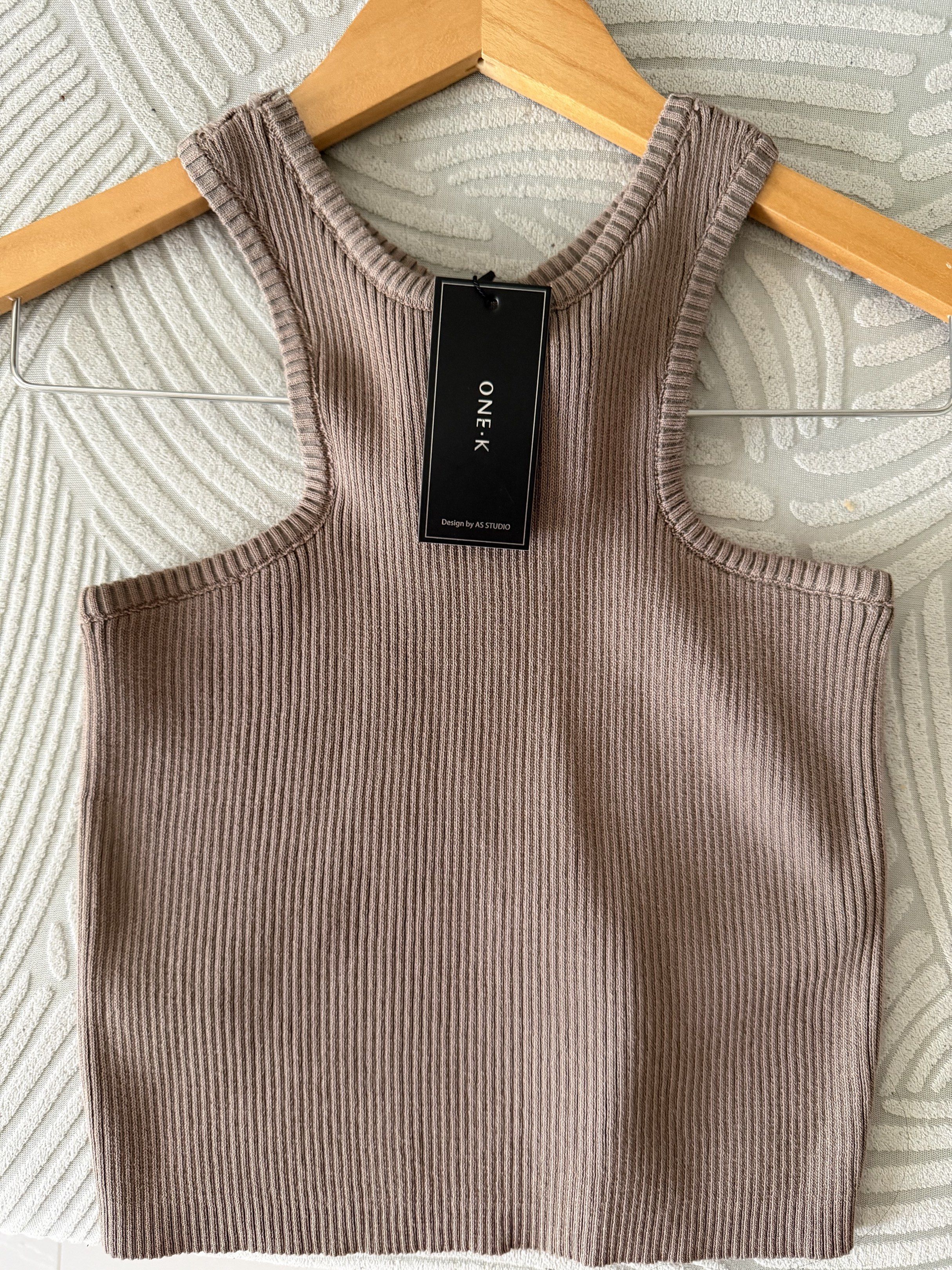 ONE-K Ribbed Tank Top (Category: Sleeveless) located in Paranaque City. Submitted by krishamel (Listing ID 1418634177, Image 1). Description: - ONE.K Ribbed Tank Top - Scoop neck and racerback design - Brand new with tag .