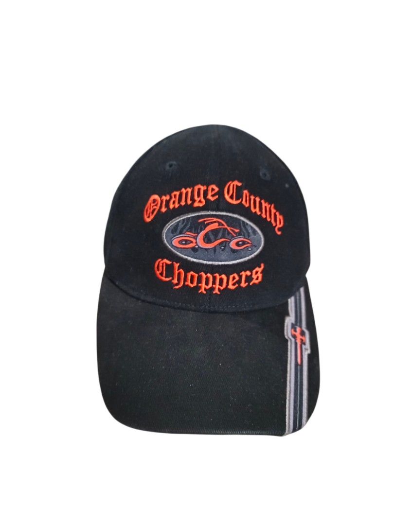 Orange County Choppers Cap (Category: Caps & Hats) located in General Santos City (Dadiangas). Submitted by _jackeith (Listing ID 1418743428, Image 1). Description: - Black cap featuring the Orange County Choppers logo embroidered on the front. - The cap has a curved brim and a New Era logo on the side. - The back of the cap has the letters "OCC" embroidered in orange. - The inside of the cap has a Bio-Domes tag. - Size (XS-S) .