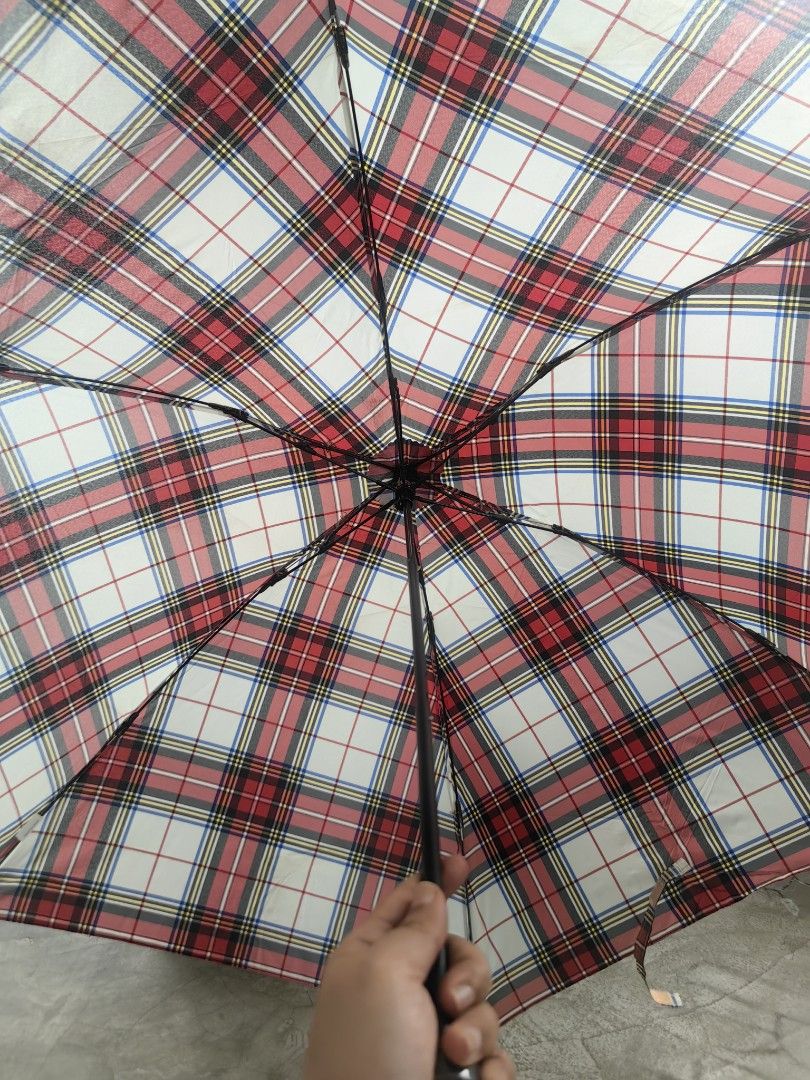 Plaid Pattern Japan Umbrella (Category: Umbrellas) located in Legazpi City. Submitted by riris.unique.finds (Listing ID 1418613451, Image 2). Description: - Classic plaid pattern (red, white, black) - Black handle - Compact and easy to store - Stylish and practical Dimensions: Open width: 35 inches Close length: 9 inches Open length: 20 inches.