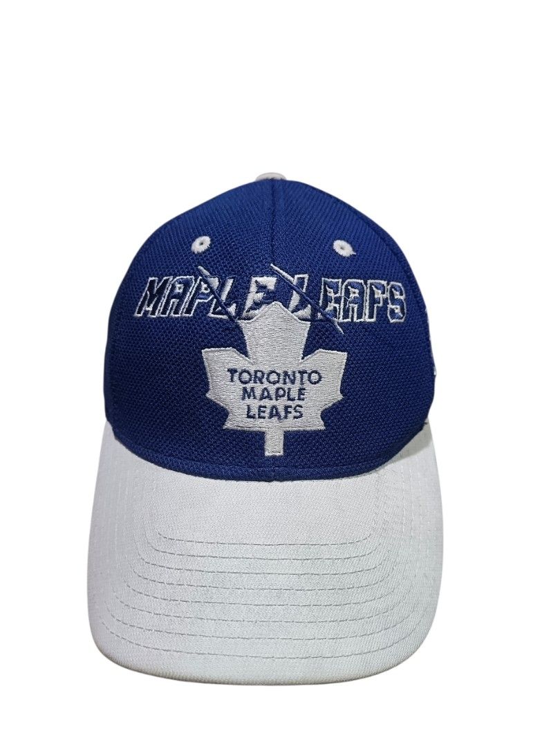 Reebok Toronto Maple Leafs Cap (Category: Caps & Hats) located in General Santos City (Dadiangas). Submitted by _jackeith (Listing ID 1418743279, Image 1). Description: -Cap features the Toronto Maple Leafs logo on the front. -It has a blue crown and a white brim. The cap is made by Reebok and has the NHL logo on the back. -The size is S/M. -The cap is part of the Center Ice Collection..