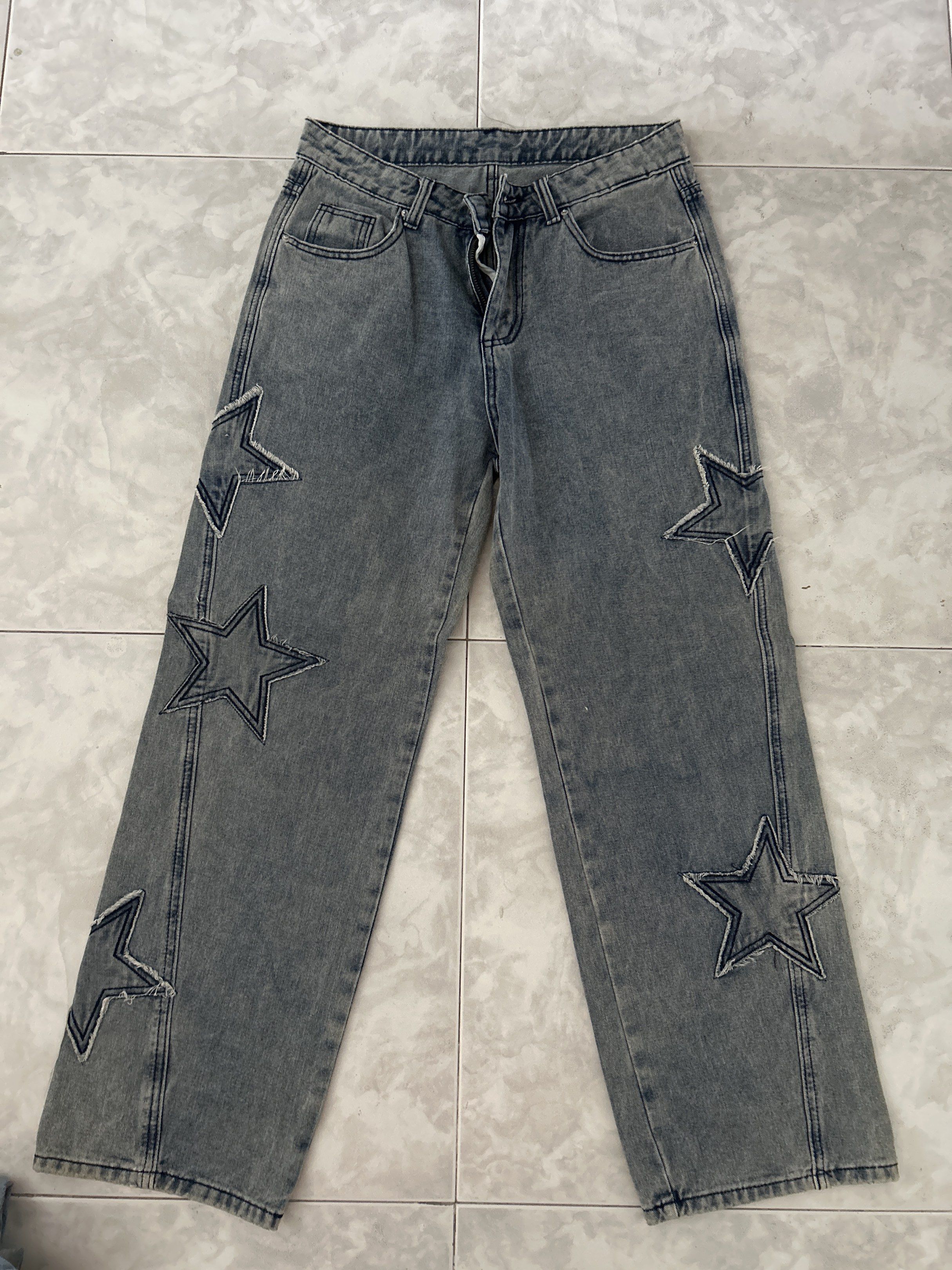Star Patchwork Jeans (Category: Jeans & Leggings) located in Singapore. Submitted by pipispipi (Listing ID 1418637814, Image 1). Description: - Stylish blue jeans - Star patchwork design - Straight leg fit - Brand new.