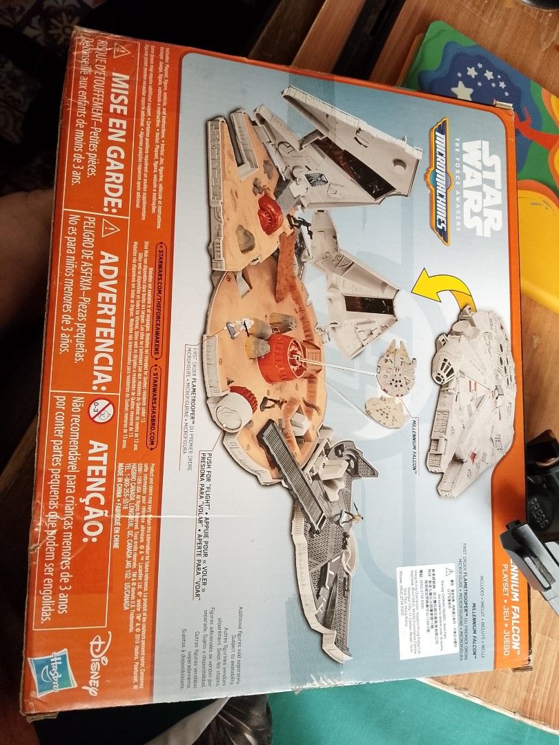 Star Wars Micro Machines Millennium Falcon Playset (Category: Action & Battle Toys) located in Quezon. Submitted by lled23 (Listing ID 1418625408, Image 3). Description: - Star Wars Micro Machines Millennium Falcon playset - From The Force Awakens series - Features the Millennium Falcon transforming into a playset - Includes various vehicles and figures - Hasbro product - Box shows other Micro Machines sets.