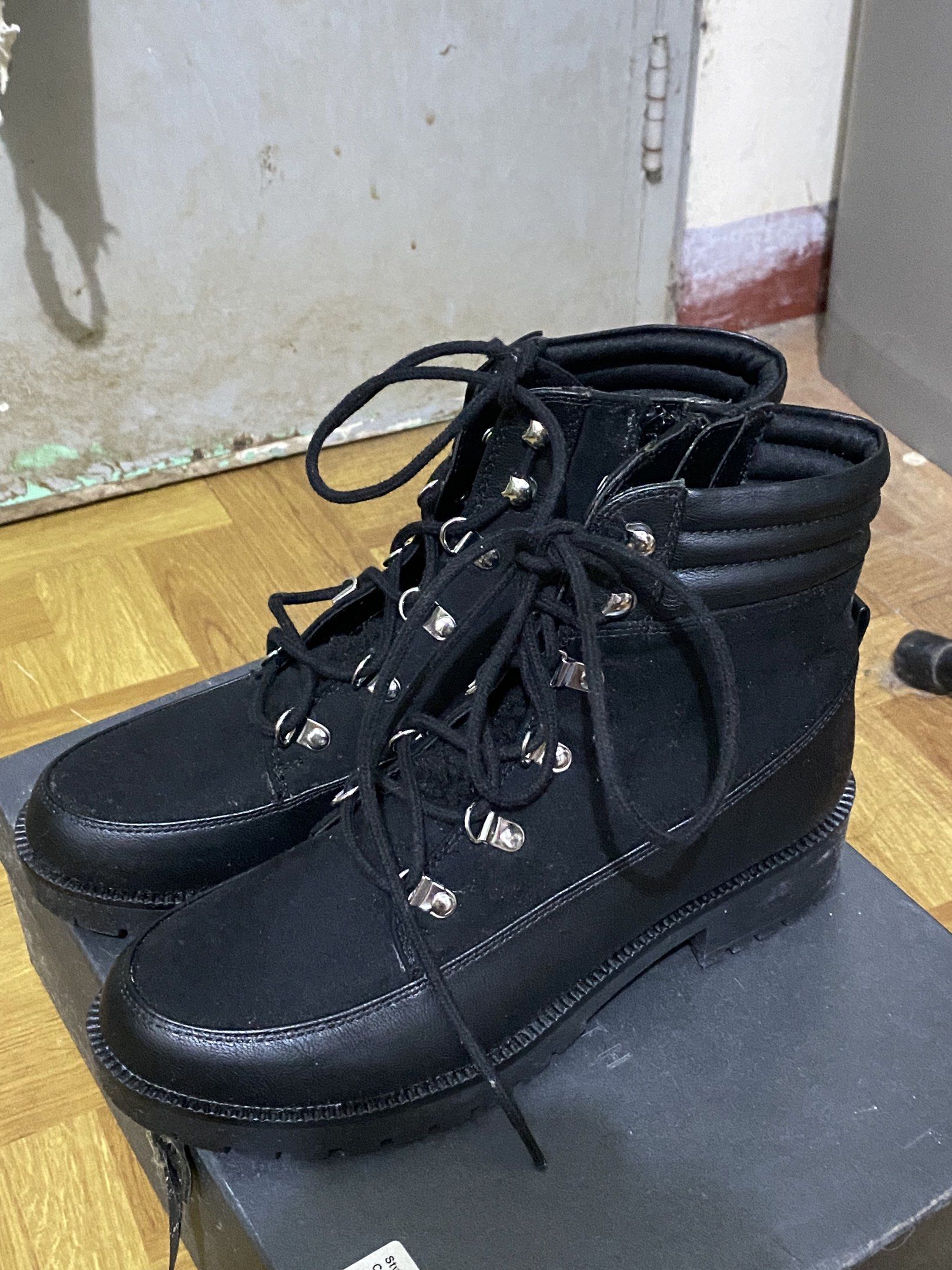Style & Co Black Boots Size 8 (Category: Boots) located in Paranaque City. Submitted by elizahserr40438 (Listing ID 1418746642, Image 1). Description: - Style & Co black boots - Size 8 - Lace-up design with metal eyelets - Side zipper - Chunky sole - Made of leather and suede-like material.