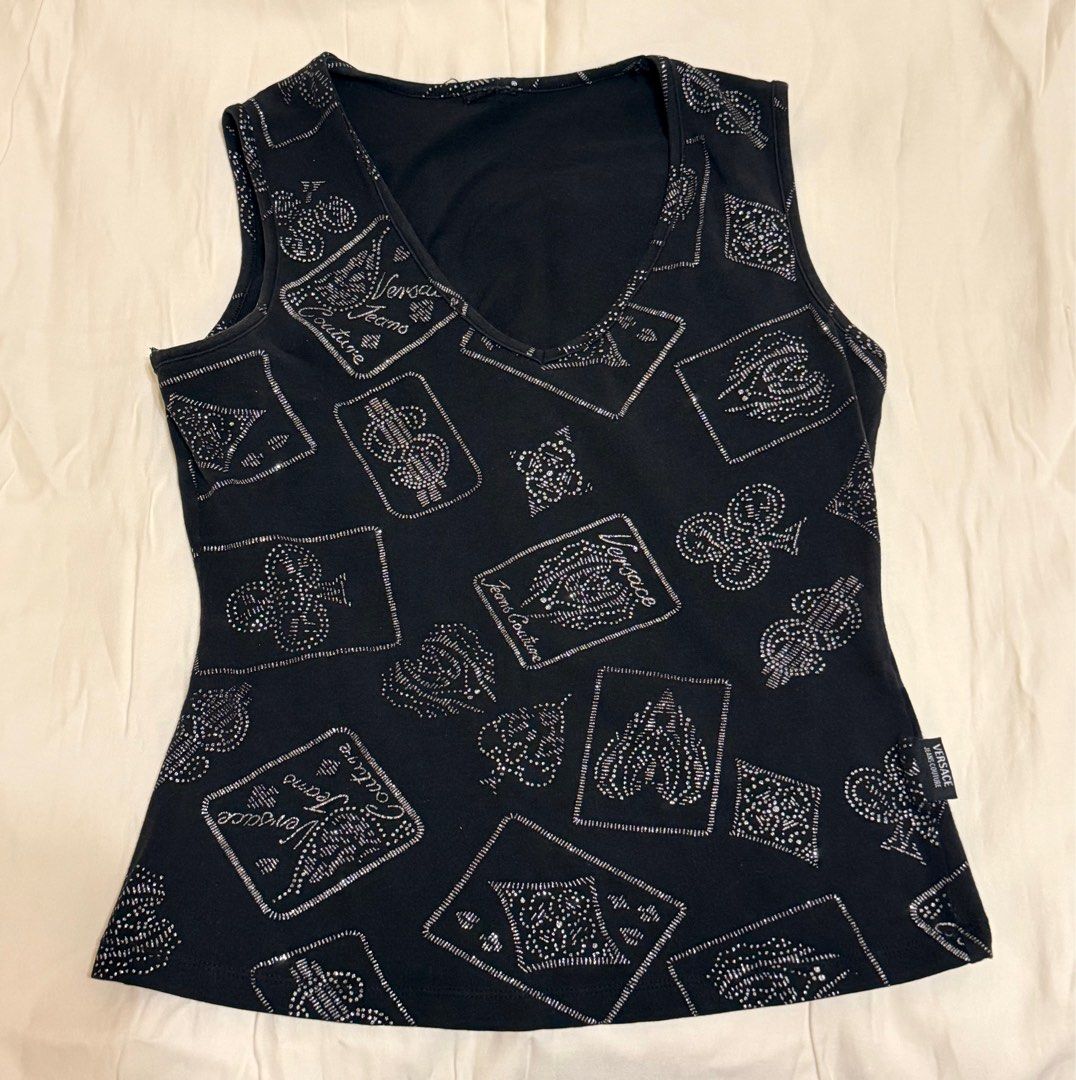 vintage y2k versace sleeveless top (Category: Sleeveless) located in Pasig City. Submitted by beediz (Listing ID 1418696871, Image 1). Description: suuuuper y2k versace branded top! so pretty - stretchy! - soft cotton with silver details - waist snatching tbh - cut tag but fits best on m-l <3 rfs: decluttering price nego if buying 2 or more items!!.
