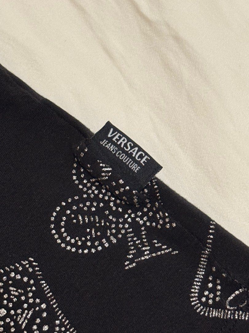vintage y2k versace sleeveless top (Category: Sleeveless) located in Pasig City. Submitted by beediz (Listing ID 1418696871, Image 3). Description: suuuuper y2k versace branded top! so pretty - stretchy! - soft cotton with silver details - waist snatching tbh - cut tag but fits best on m-l <3 rfs: decluttering price nego if buying 2 or more items!!.