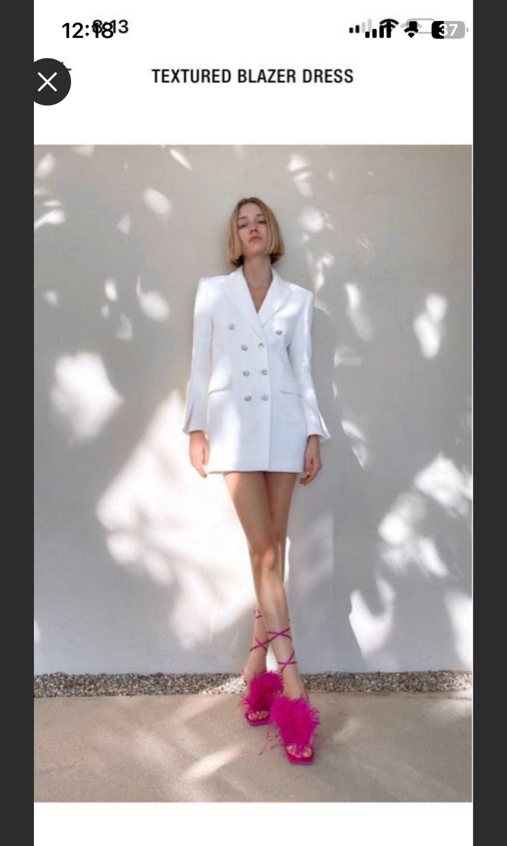Zara Textured Blazer Dress - Size M (Category: Dresses) located in Agoo. Submitted by krizsel (Listing ID 1418628545, Image 1). Description: - Zara white textured blazer dress - Size: M - Condition: New with tags - Design: Double-breasted with decorative buttons - Fit: Tailored - Length: Mini.
