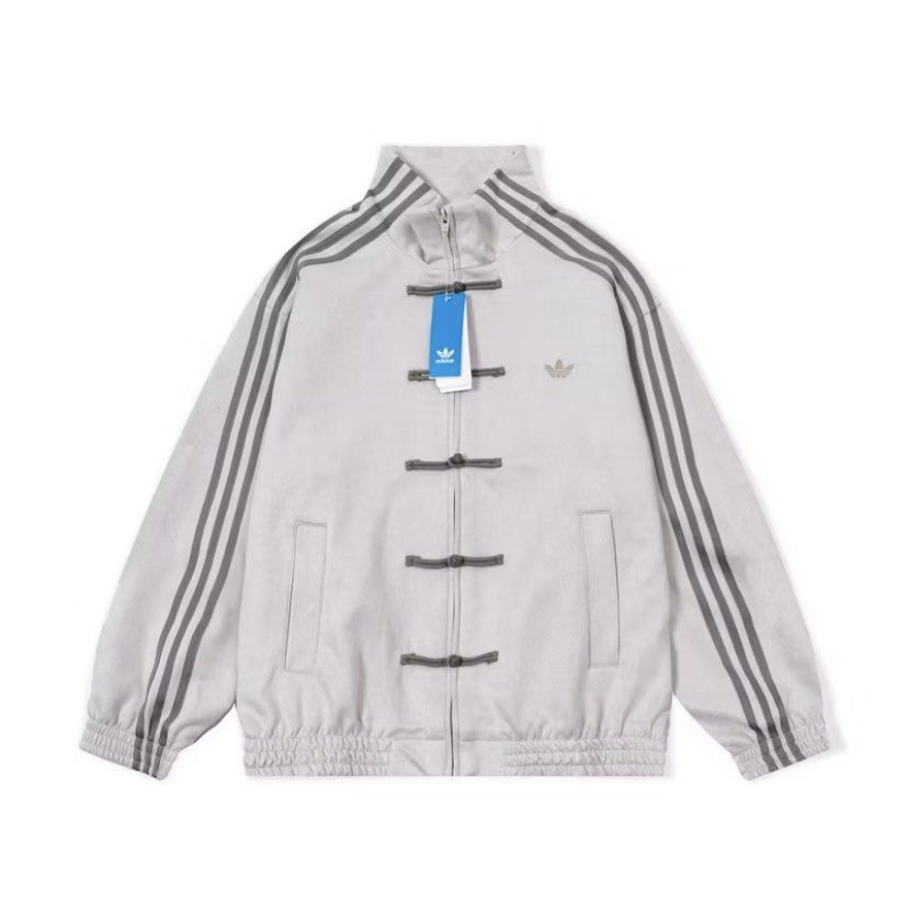 Adidas Track Jacket with Chinese Knot Buttons (Category: Coats, Jackets and Outerwear) located in Quezon City. Submitted by mssaiira (Listing ID 1418837379, Image 2). Description: - Adidas track jacket - Unique Chinese knot button design - Classic three stripes on sleeves - Small Adidas logo on chest - High collar - Two front pockets - Available in multiple colors - Sizes S-XL - PRE ORDER.