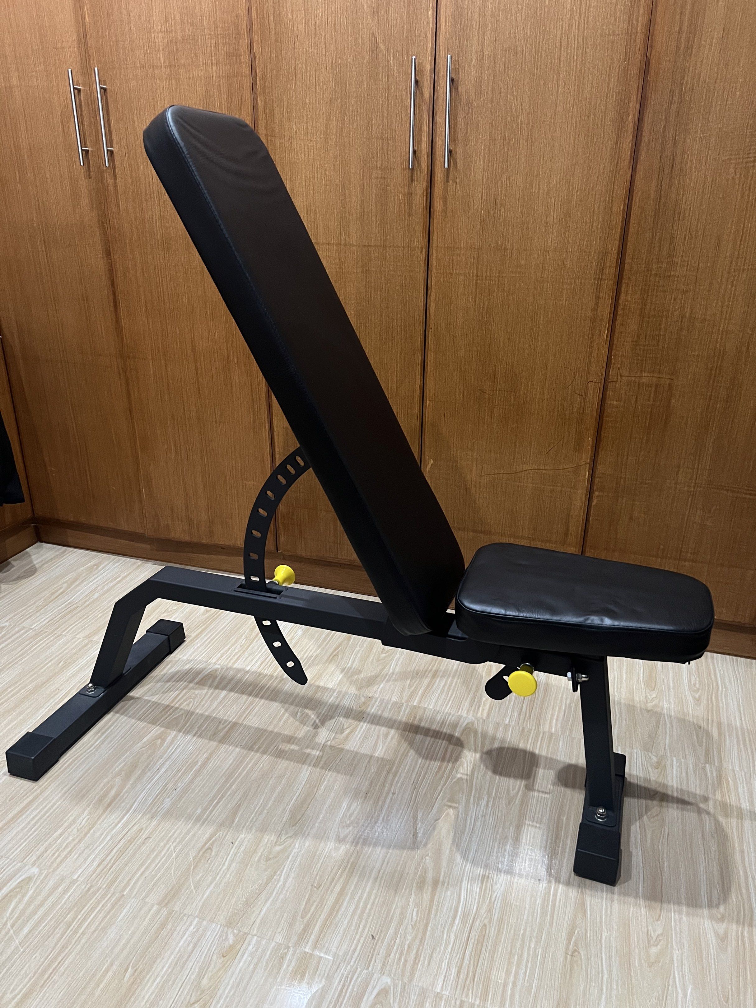 Adjustable Bench Press (Category: Weights & Dumbbells) located in Taguig. Submitted by ggamulo (Listing ID 1418912146, Image 2). Description: - Adjustable weight bench - Black frame and seat - Adjustable backrest and seat .