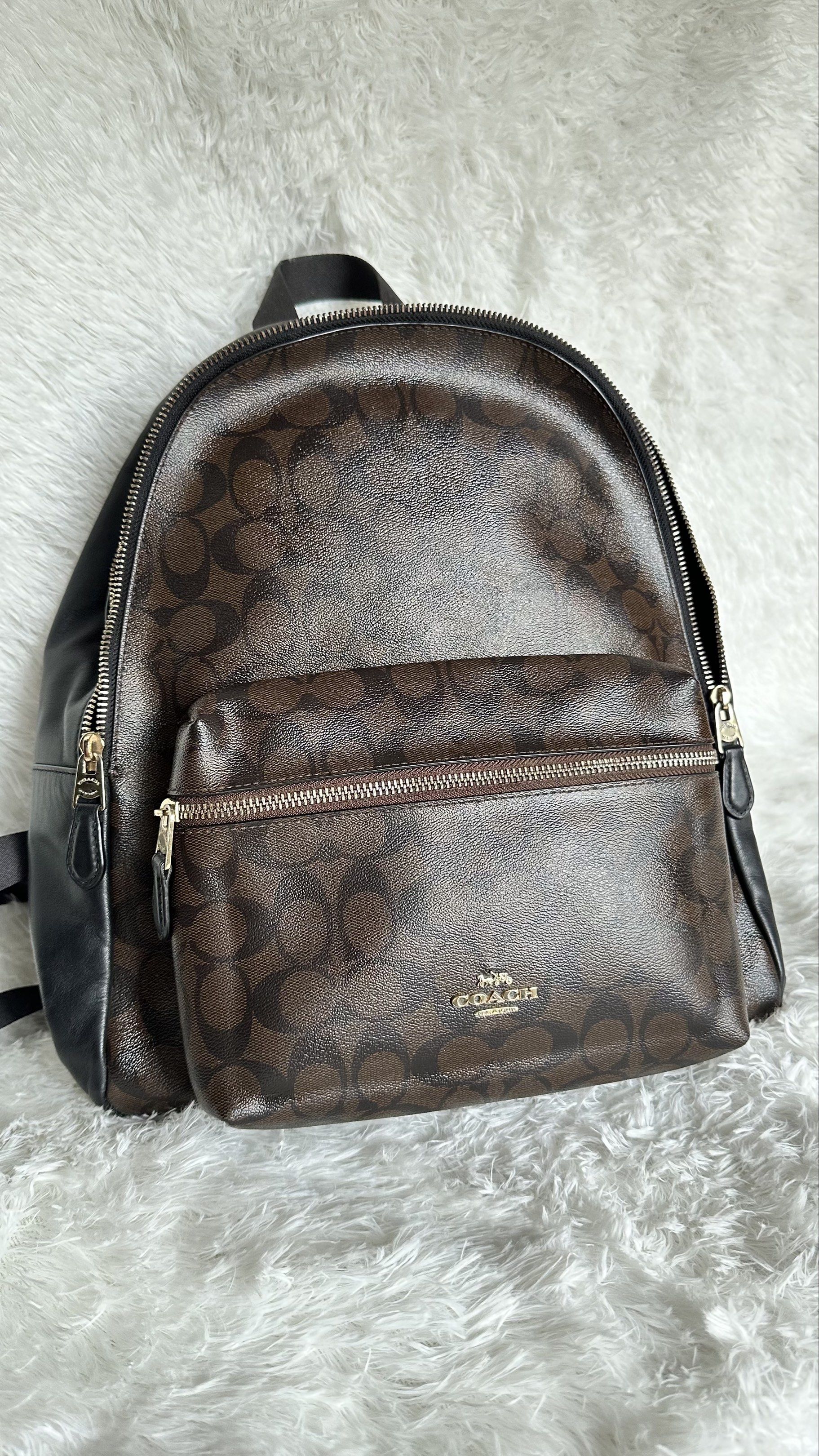 Authentic Coach Charlie Backpack Medium (Category: Luxury Bags & Wallets) located in Manila. Submitted by pamsayat (Listing ID 1418847532, Image 1). Description: Issue/s: • Minimal tarnish on zipper • Signs of previous wear • Apart from the mentioned issue, the bag is in excellent condition Reminders: • Fixed price • This is a preloved bag. Please expect some imperfections due prior use. • No return or exchange. All sales are final. Please ensure
