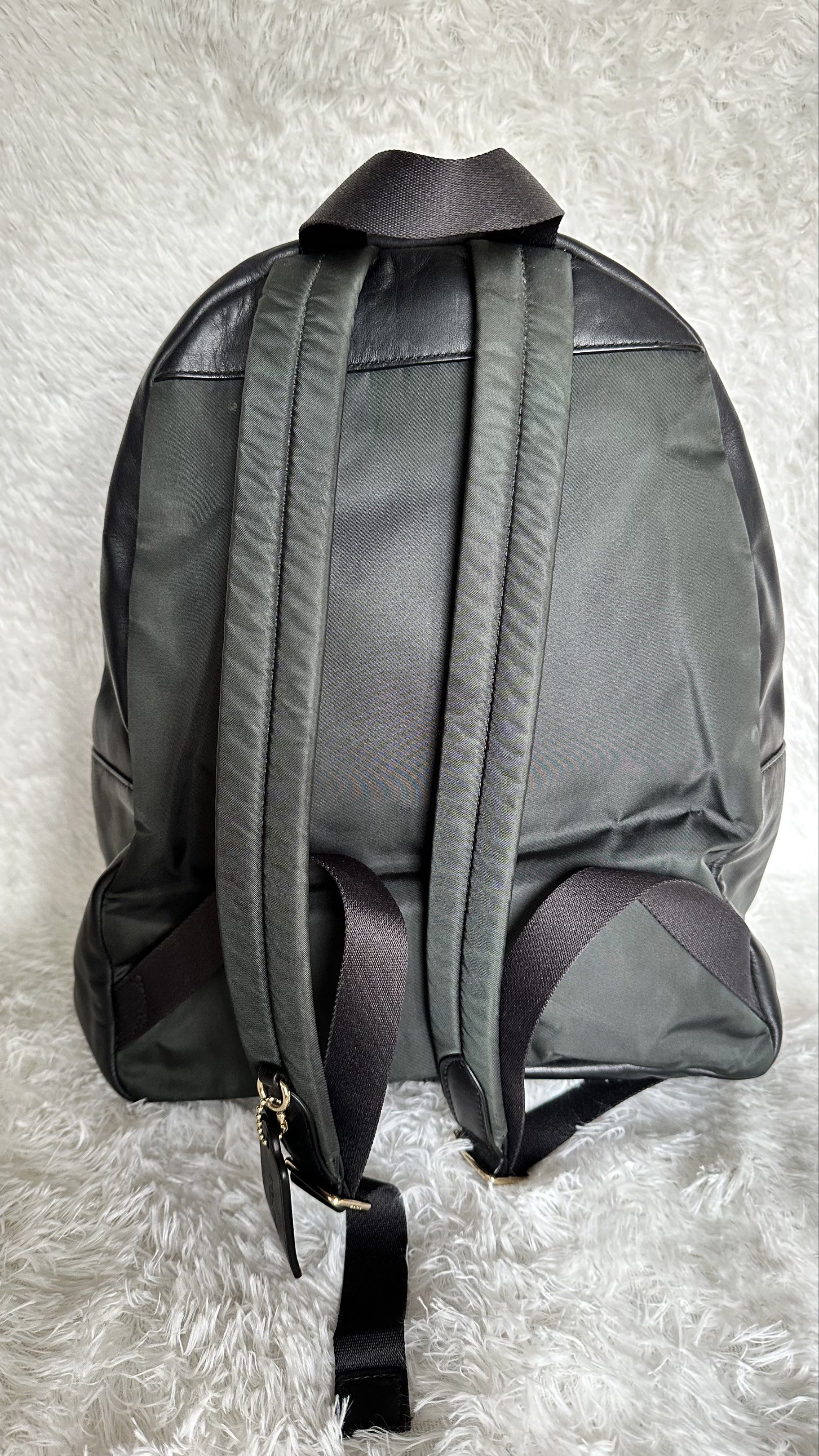 Authentic Coach Charlie Backpack Medium (Category: Luxury Bags & Wallets) located in Manila. Submitted by pamsayat (Listing ID 1418847532, Image 3). Description: Issue/s: • Minimal tarnish on zipper • Signs of previous wear • Apart from the mentioned issue, the bag is in excellent condition Reminders: • Fixed price • This is a preloved bag. Please expect some imperfections due prior use. • No return or exchange. All sales are final. Please ensure