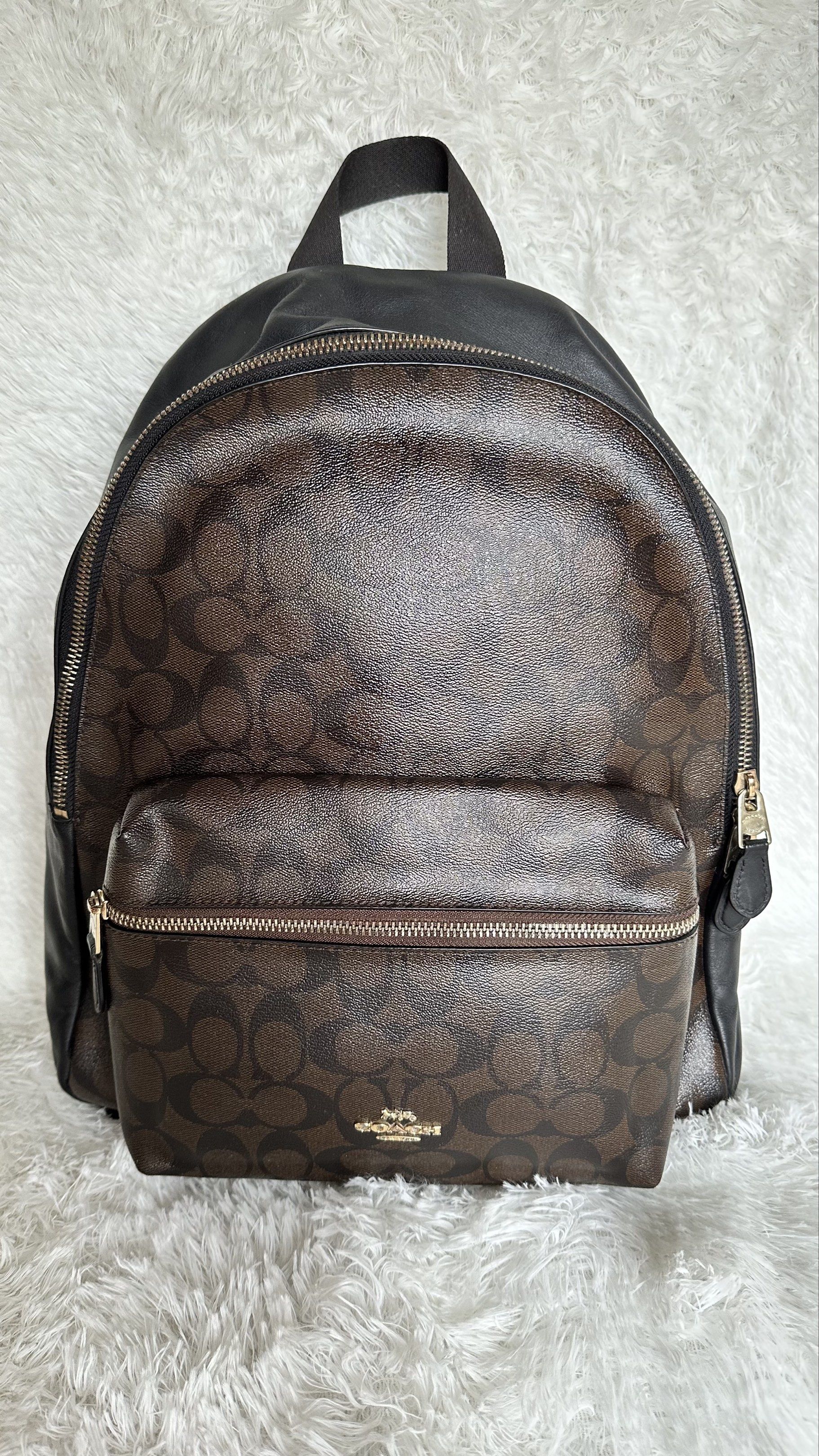 Authentic Coach Charlie Backpack Medium (Category: Luxury Bags & Wallets) located in Manila. Submitted by pamsayat (Listing ID 1418847532, Image 2). Description: Issue/s: • Minimal tarnish on zipper • Signs of previous wear • Apart from the mentioned issue, the bag is in excellent condition Reminders: • Fixed price • This is a preloved bag. Please expect some imperfections due prior use. • No return or exchange. All sales are final. Please ensure