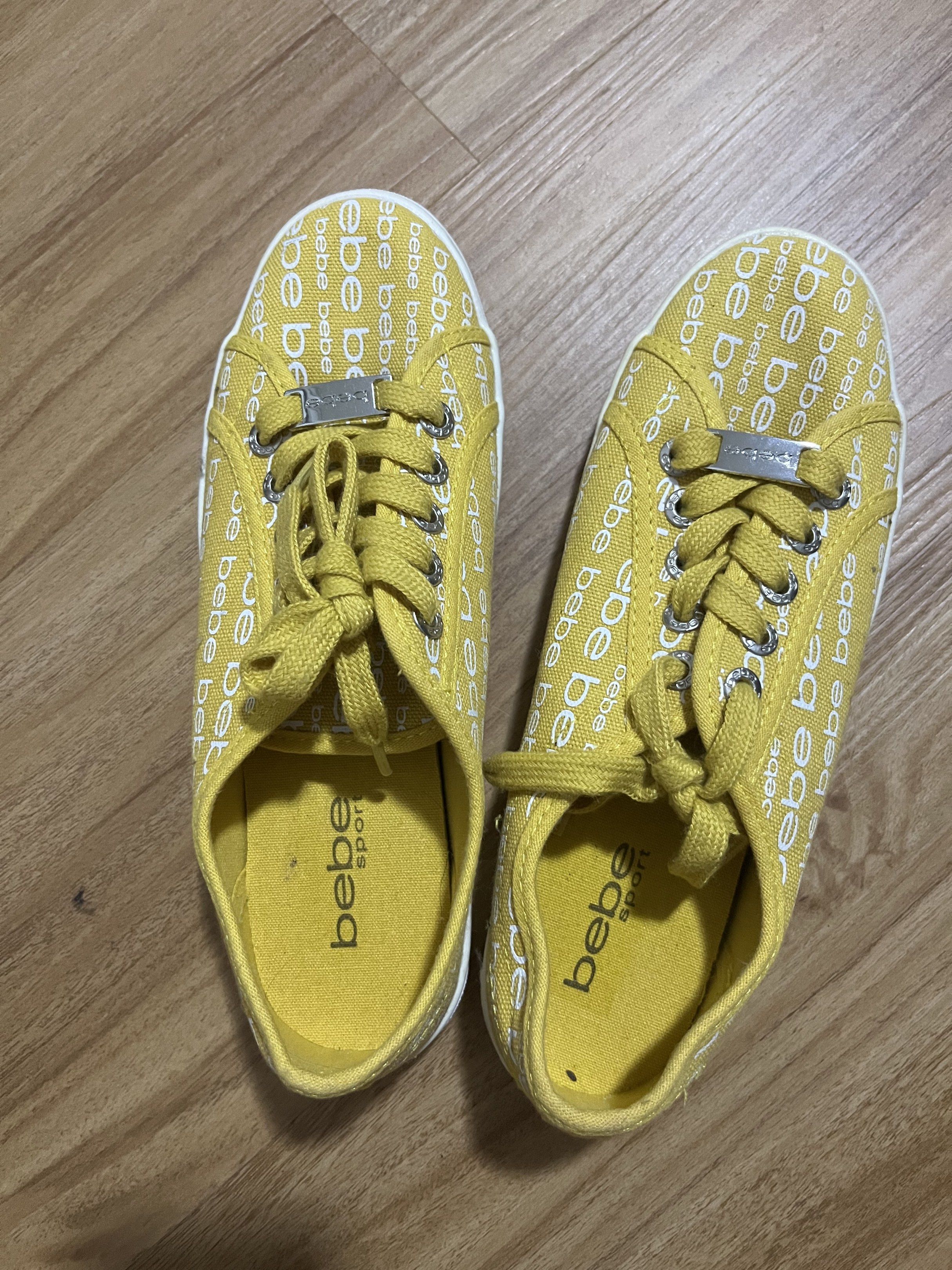 Bebe Sport Yellow Sneakers (Category: Sneakers) located in Pasig City. Submitted by mbtra (Listing ID 1418886438, Image 1). Description: - us womens 6.5 - only used once - almost brand new condition - no issues.
