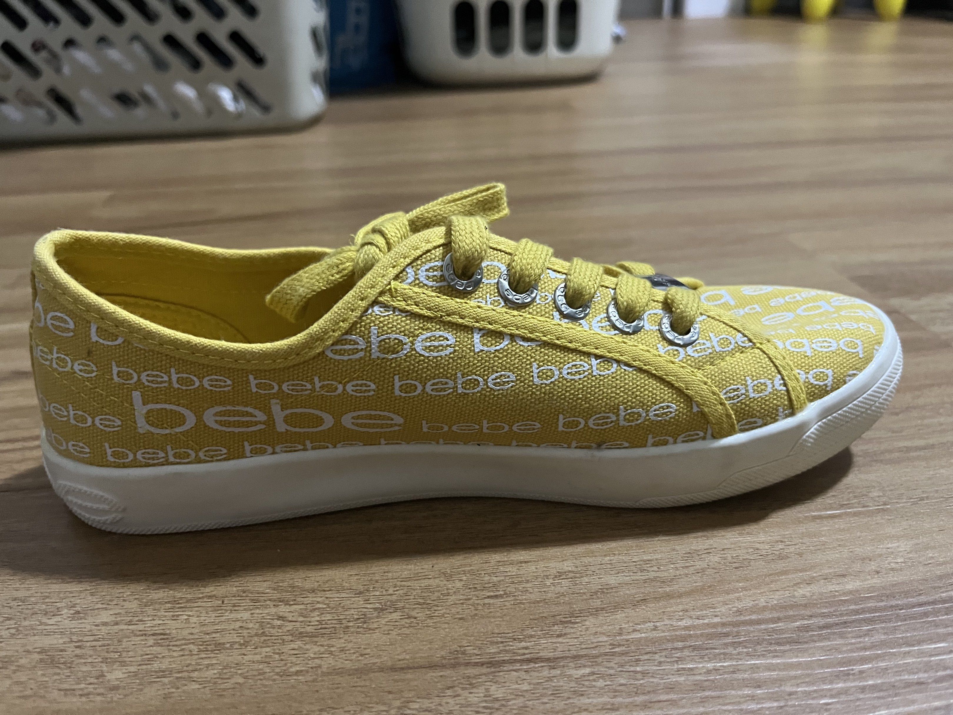 Bebe Sport Yellow Sneakers (Category: Sneakers) located in Pasig City. Submitted by mbtra (Listing ID 1418886438, Image 3). Description: - us womens 6.5 - only used once - almost brand new condition - no issues.