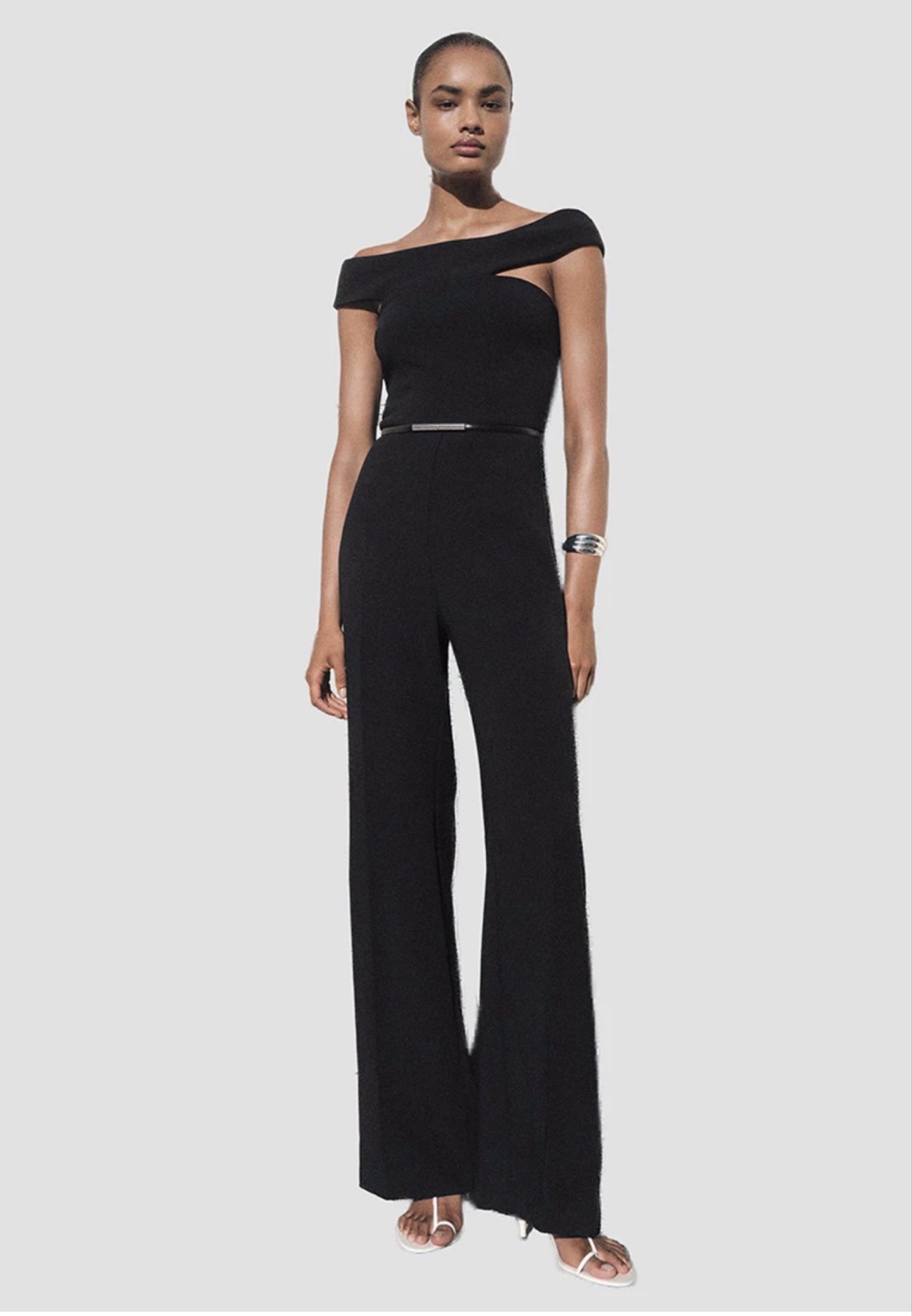 Mango Black Off-Shoulder Jumpsuit (Category: Jumpsuits) located in Quezon City. Submitted by prelaved (Listing ID 1418966424, Image 1). Description: Orig price: P 3995 rfs: too long on me im only 5”0 ft- bought it online Mango Site - never worn ‼️ - shala and nakakasexy - Black off-shoulder jumpsuit - Cutout detail - Wide-leg pants - Includes a thin belt - V-neck back - Ideal for special events and nights out - Offers a sleek and sophisticated lo