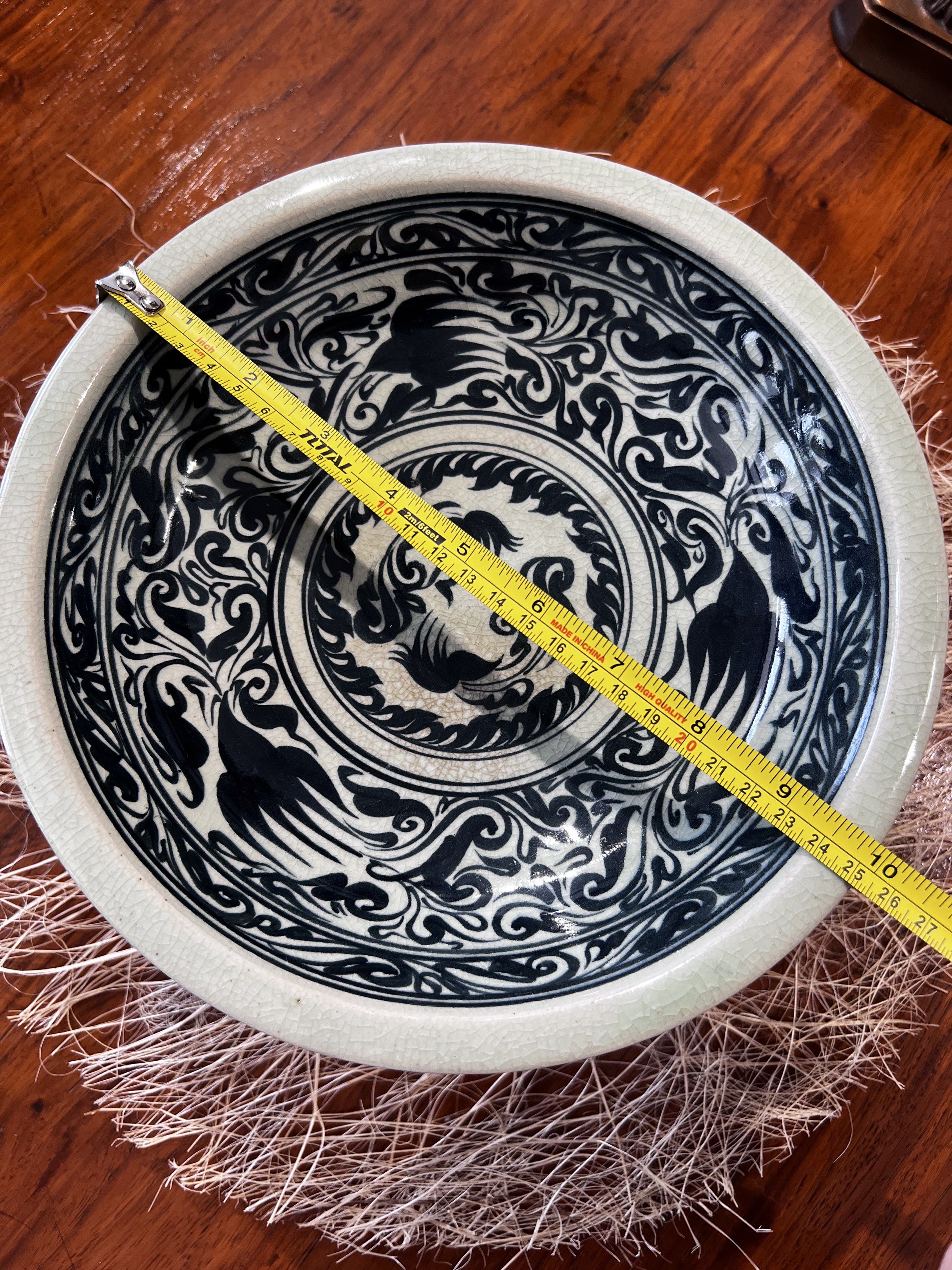 Blue and White Ceramic Pedestal Bowl (Category: Other Kitchenware & Tableware) located in Taguig. Submitted by RandomR7 (Listing ID 1418807658, Image 3). Description: - ceramic bowl - Beautiful blue and white design - Intricate patterns and bird motifs - Pedestal base and wide rim - Approximately 25 cm diameter - Ideal decorative piece RFS : Decluttering and change the theme of the house to Minimalist. .