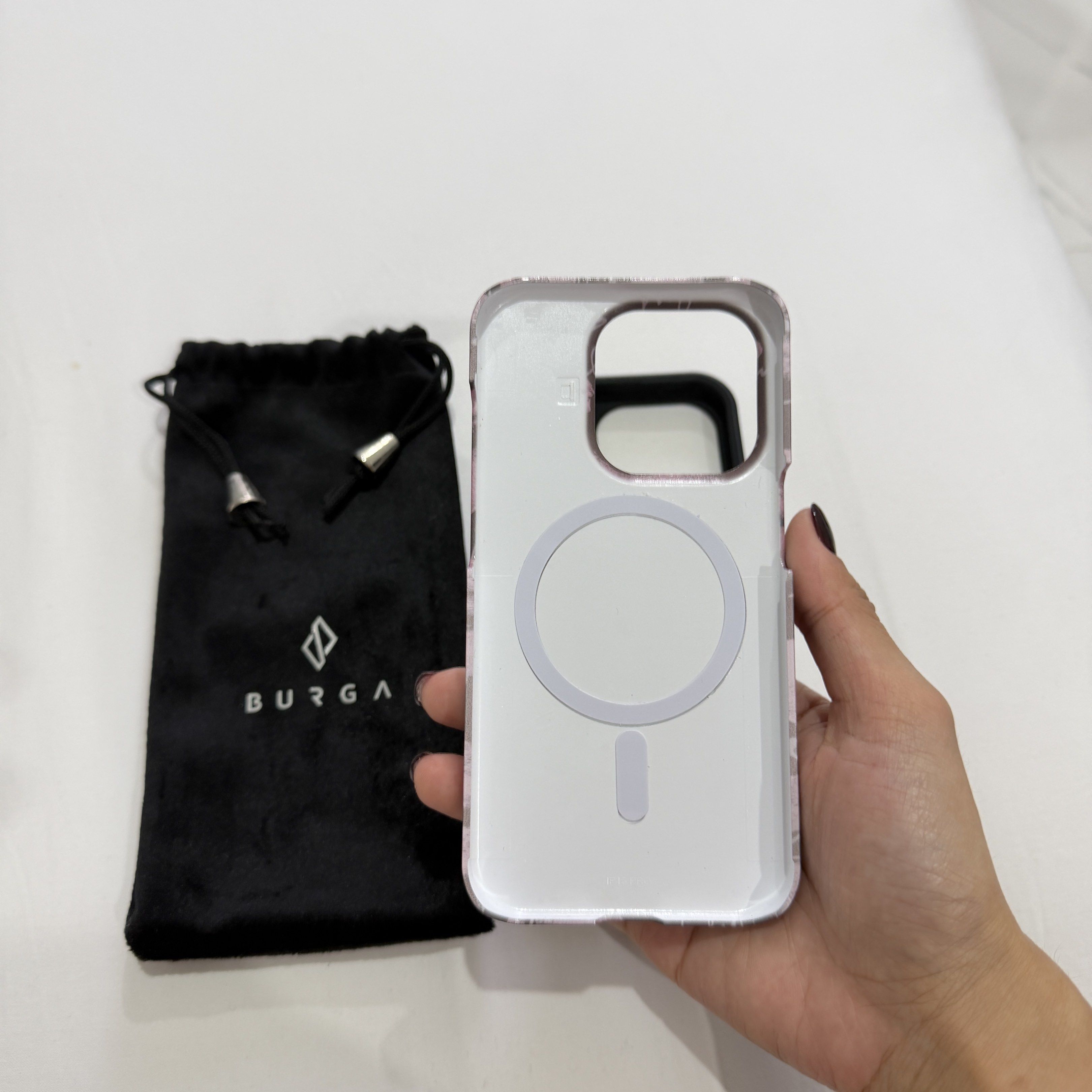 Burga Magsafe Case for iPhone 15 Pro (Category: Cases & Sleeves) located in Rizal. Submitted by milktoasttt (Listing ID 1418793085, Image 2). Description: - Original - iPhone 15 Pro - Issue on the pic.