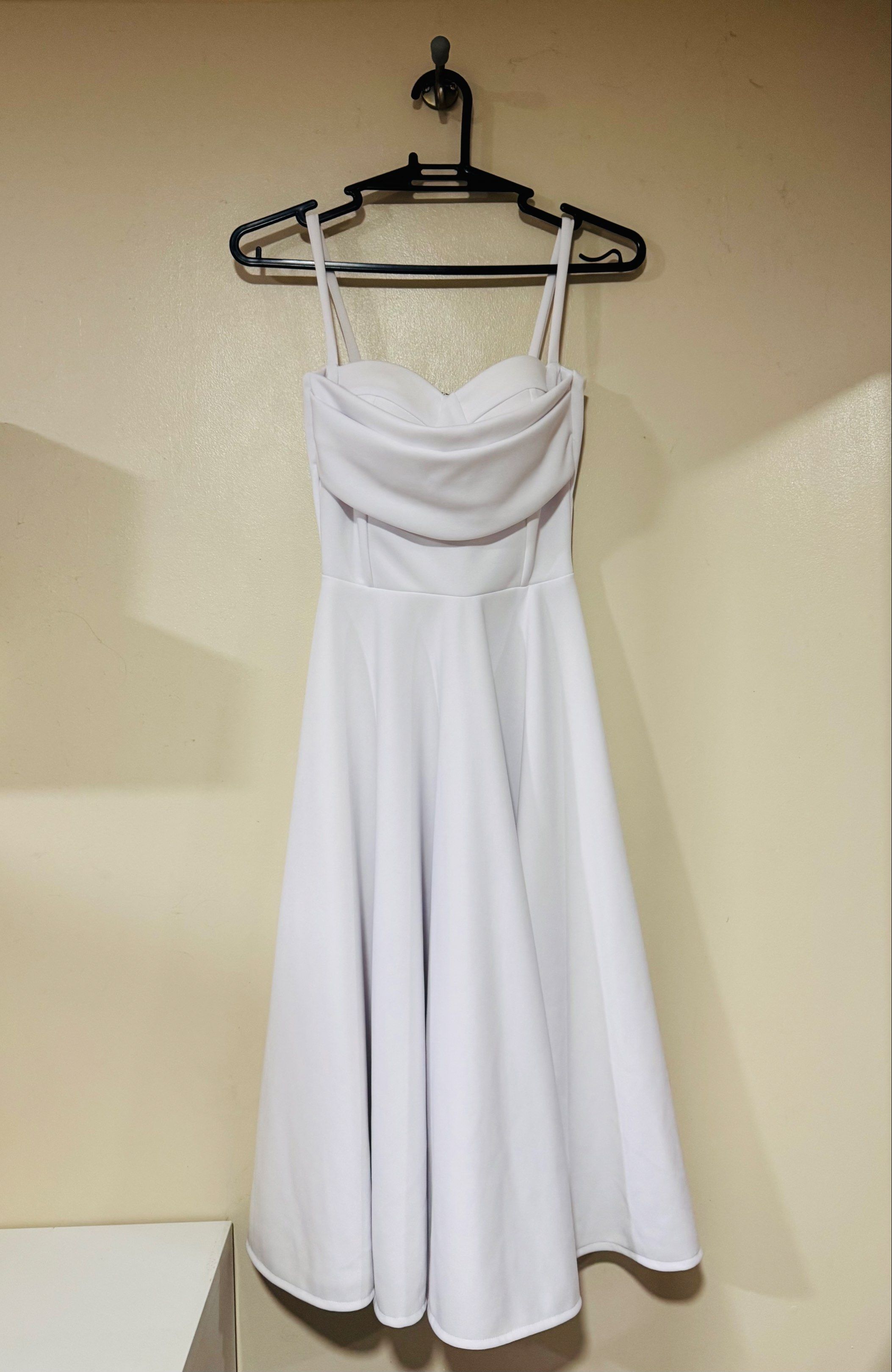 Bustier Midi Dress in White (Category: Dresses) located in Caloocan City. Submitted by andii.rhei (Listing ID 1418874193, Image 1). Description: -Bustier Midi Dress in White -Size: XS (Bust: 30-32 Waist: 24-27 Hips: 32-34) -Can fit up to S size -Brand: Heather Clothing -Perfect for a graduation or an event dress -Sweetheart Neckline -Padded -Cowl details -Thin straps -Back zipper fastening -Stretchable -Party -Solid -Fabric: Neoprene -95% Polyest